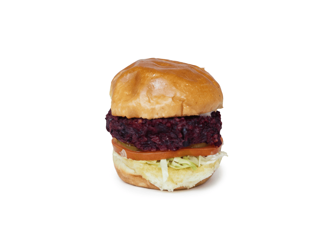 Slip Sliders Veggie sandwich featuring homemade veggie patty, lettuce, tomato, and vegan mayo.