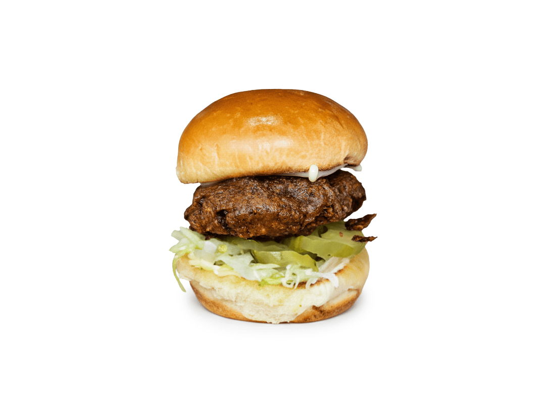 Slip Sliders Southern Comfort sandwich with crispy fried chicken, lettuce, pickles, and mayo.