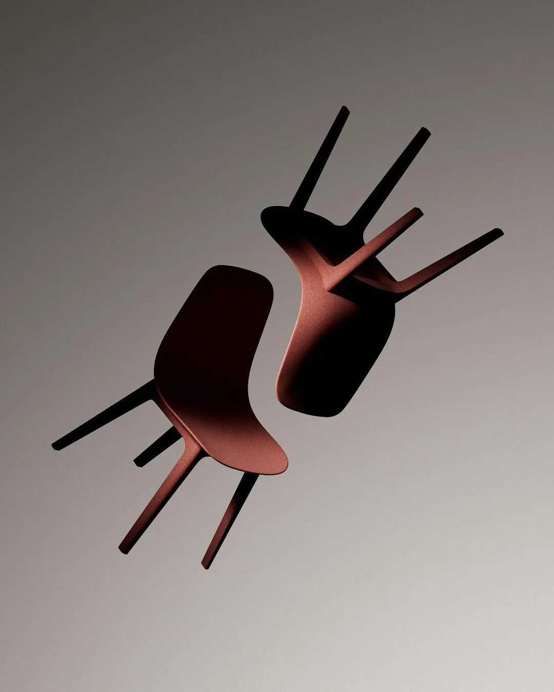 Coppia di sedie rosse di design esposte in maniera artistica nel vuoto