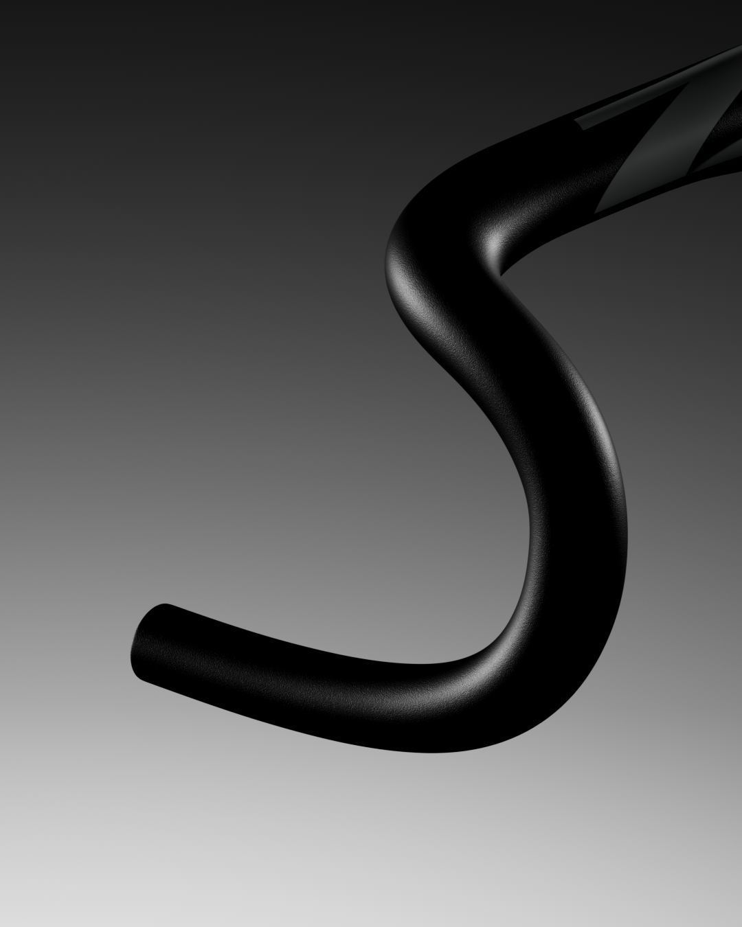 Particolare di un manubrio di bicicletta nera con sfondo sfumato