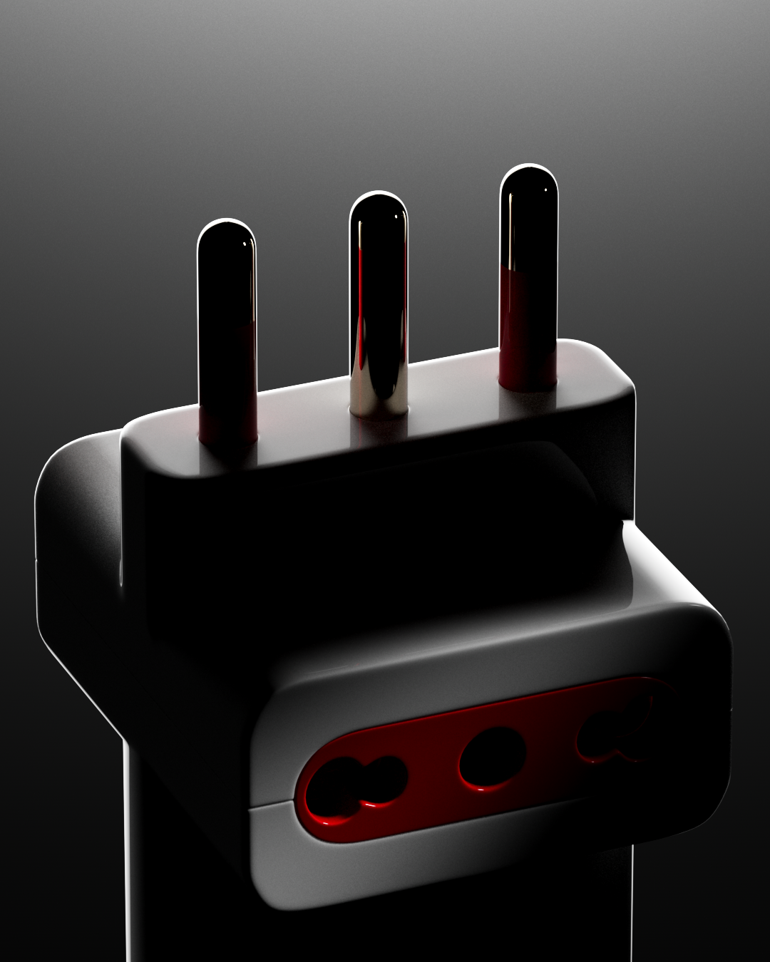 Foto di una spina elettrica con tre poli illuminati di rosso, visibile in primo piano e sfondo scuro.