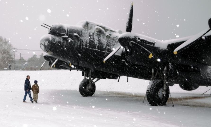  Lancaster restoration team lead Dave Saulnier grills aviation buff Euan MacDonald as they head out to the Greenwood Military Aviation Museum’s Air Park: what kind of engine? How many cylinders? How much horsepower? 