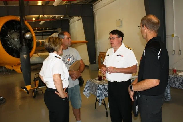  Director General of Morale and Welfare Services Commodore Sean Cantelon, second from right, with Greenwood Military Aviation Museum volunteer Dave Saulnier, second from left; 14 Wing senior manager Personnel Support Programs Mike Taylor, right, and 