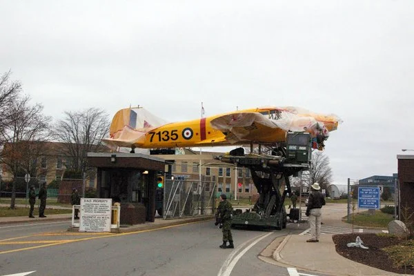 Along the route, the 42.3 foot length of the fuselage allowed just enough clearance for the Anson to pass between light poles lining the road, and its minimum height of 13.1 feet gave the needed room under overhead wires.