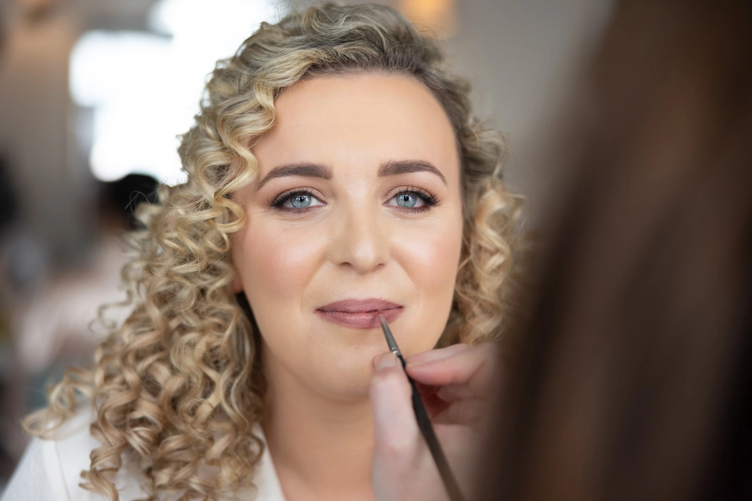 curly hair bride blonde lipstick