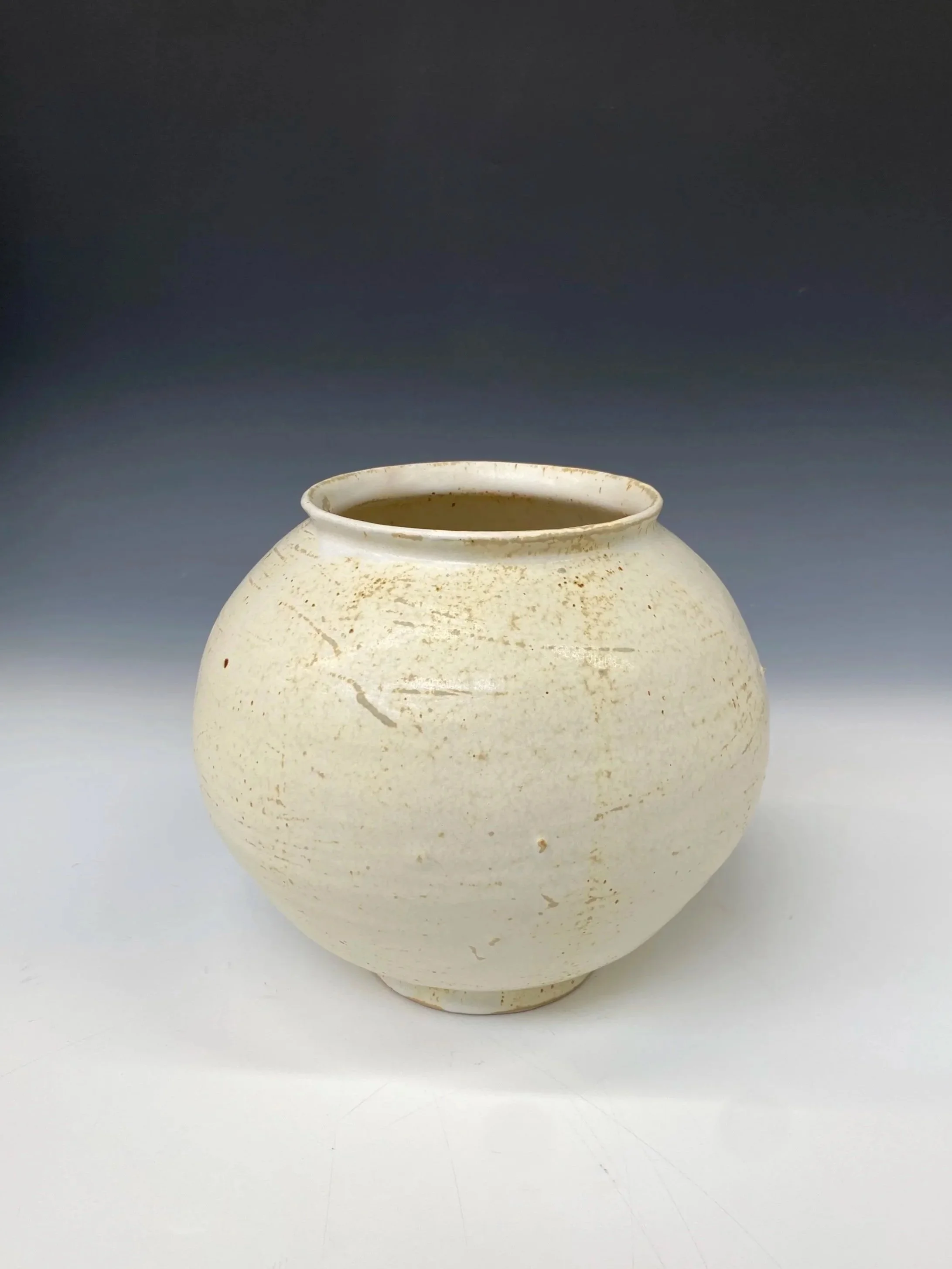 Diaspora, 2026 | 
Iron-bearing white stoneware, white slip, matt Titanium White glaze, reduction fired at 1280°C. | 23 × 23 × 20.5 cm