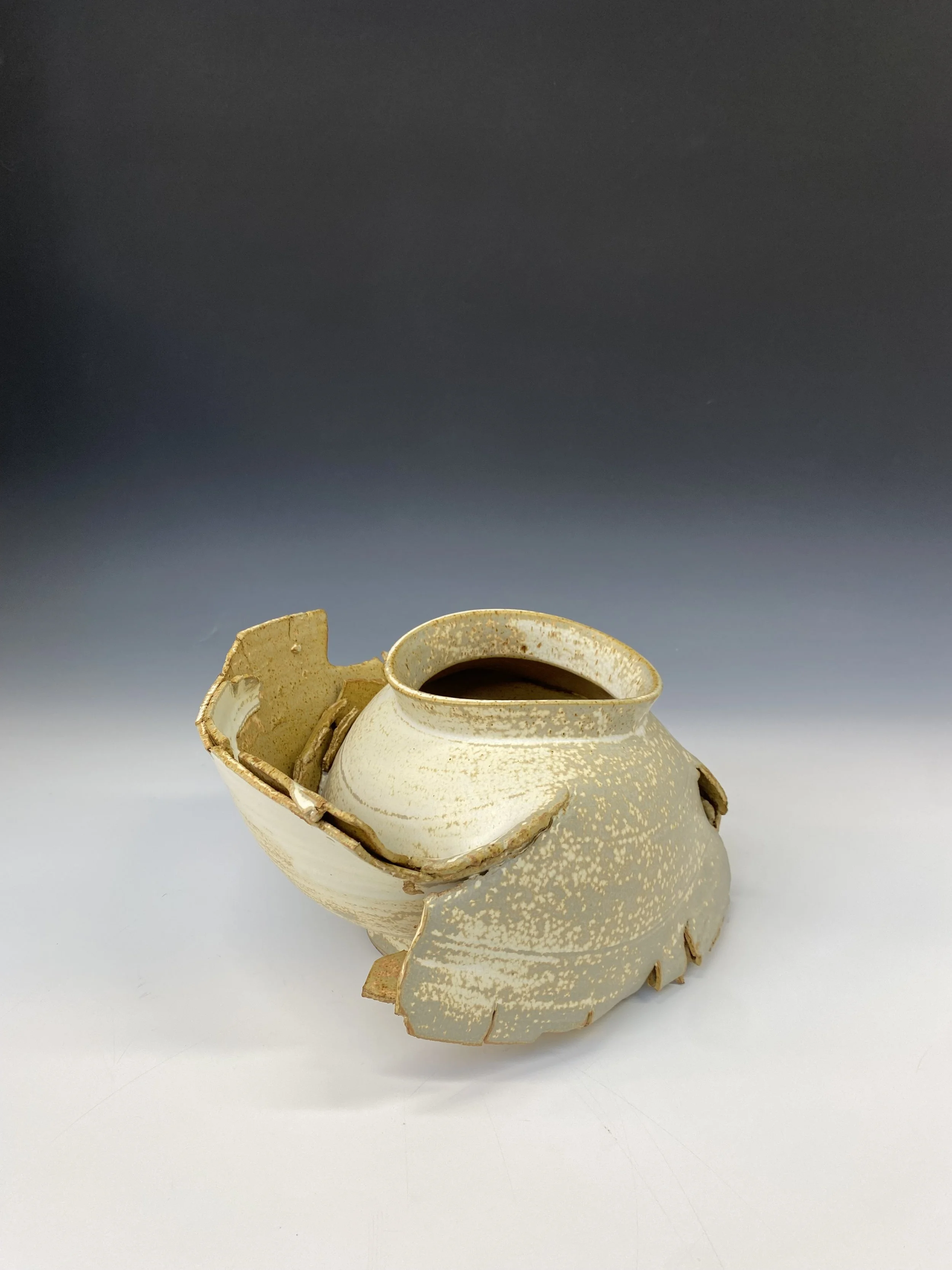 Diaspora, 2026 | 
Iron-bearing white stoneware, white slip, matt Titanium White glaze, reduction fired at 1280°C. | 33 × 32 × 18.5 cm