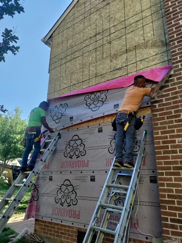underlayment is placed to further protect the home from moisture before new siding is installed