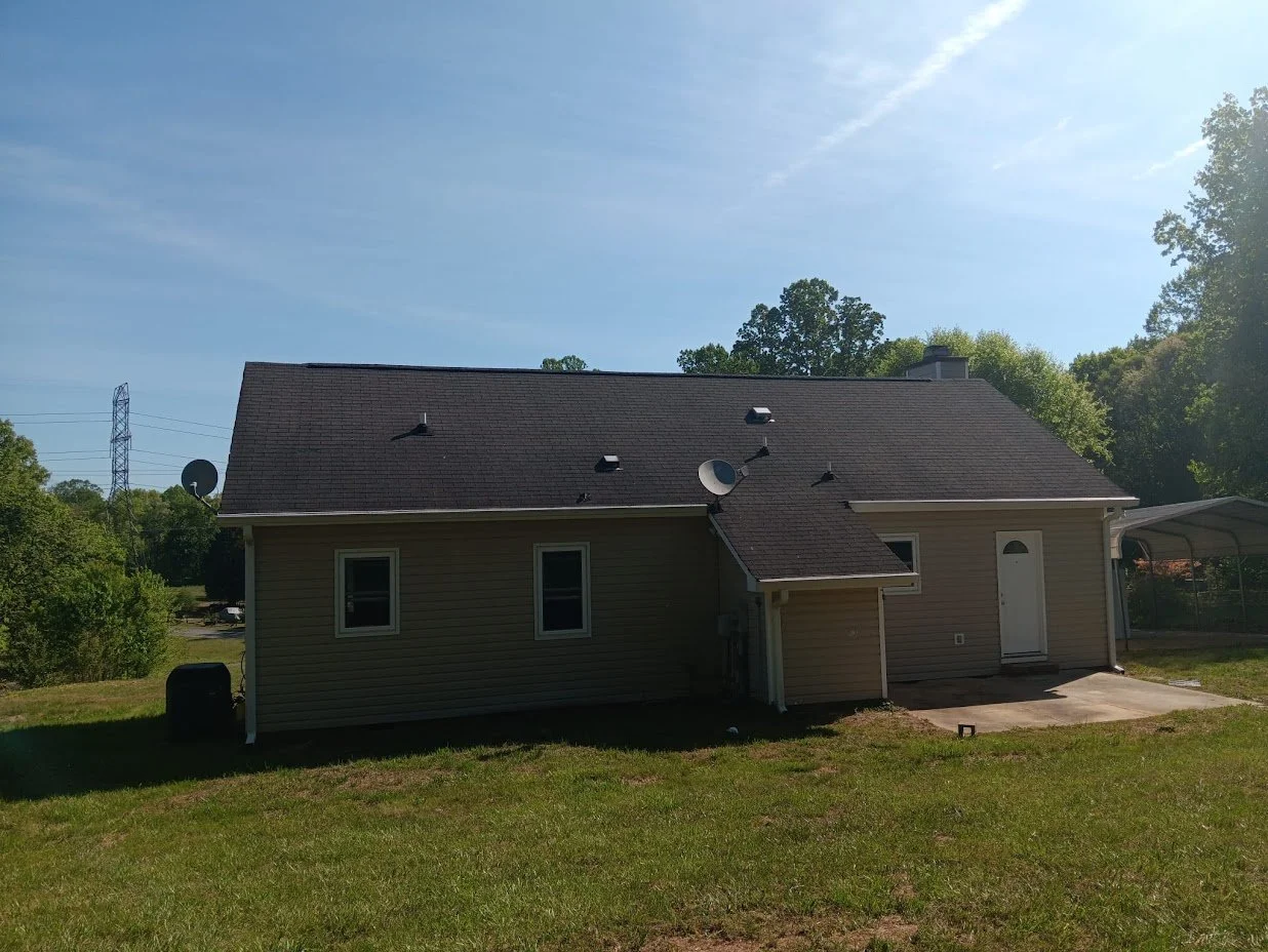 A finished shingle roof that will protect this home from the strong Piedmont North Carolina sun and rain.