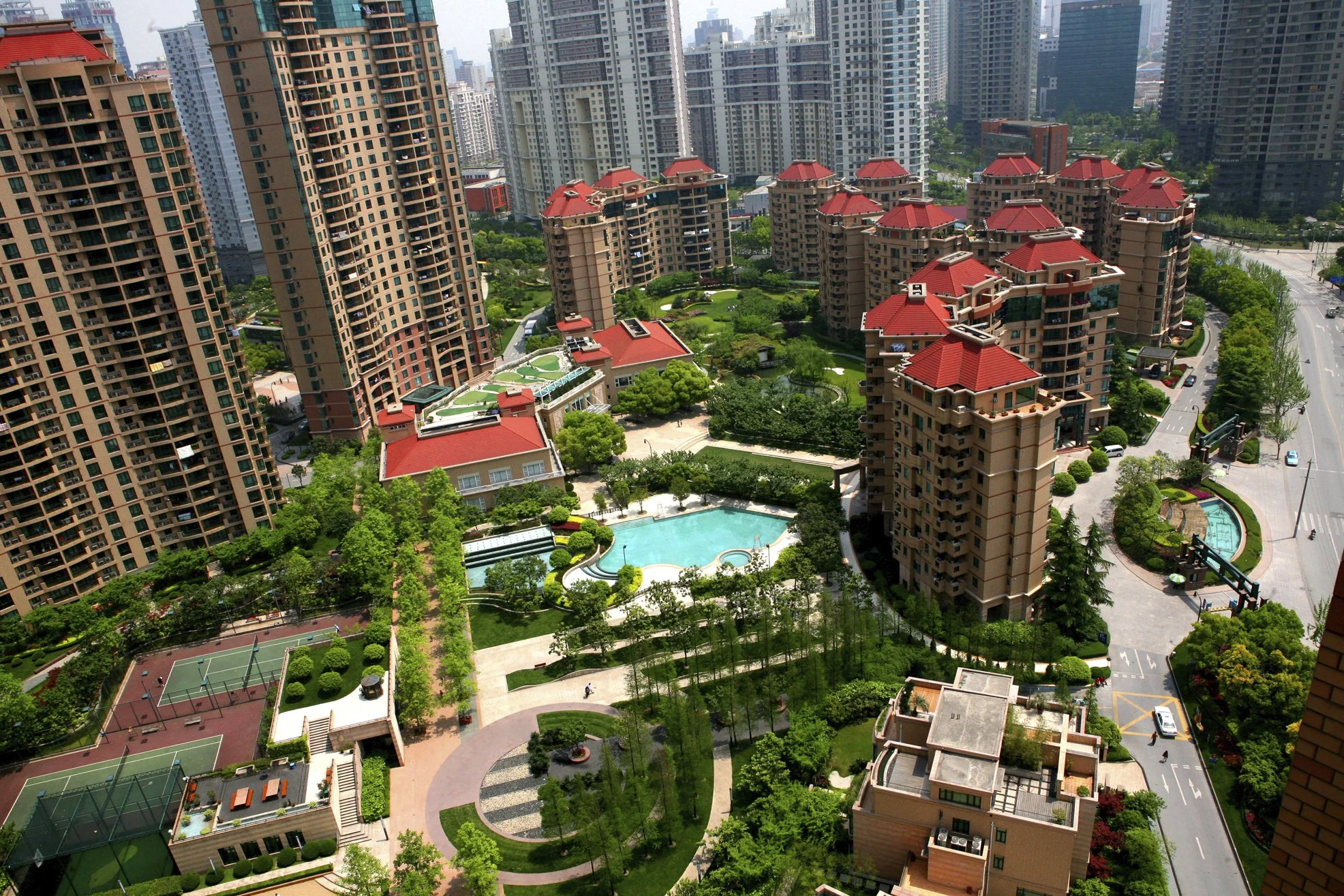 Les « villages de concubines » poussent comme des champignons en Chine. Ici, à Shanghai, les jeunes femmes vivent toutes au même endroit, dans des résidences sécurisées, véritables cages dorées.