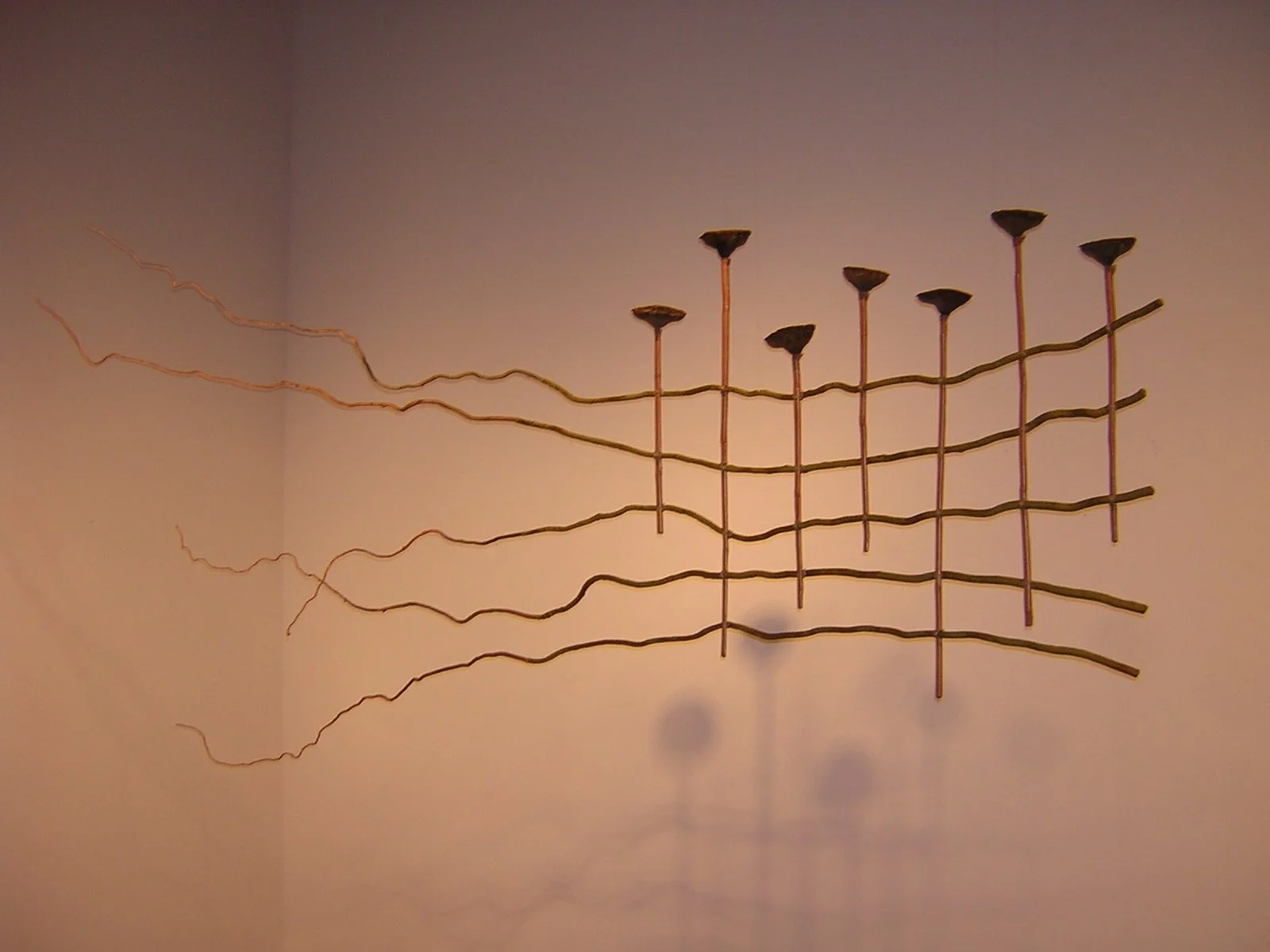 Peace Like a River
7’-0” w x 4’-6” h
Artist grown Curly Willow branches, wrapped in cloth sheath, bamboo, Lotus pods, raffia
2004