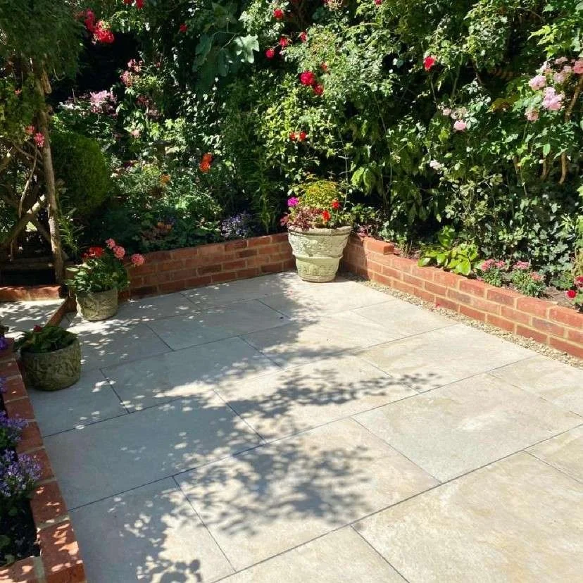 Porcelain paving installation and retaining brickwork for a Kent courtyard garden by AG Home & Gardens