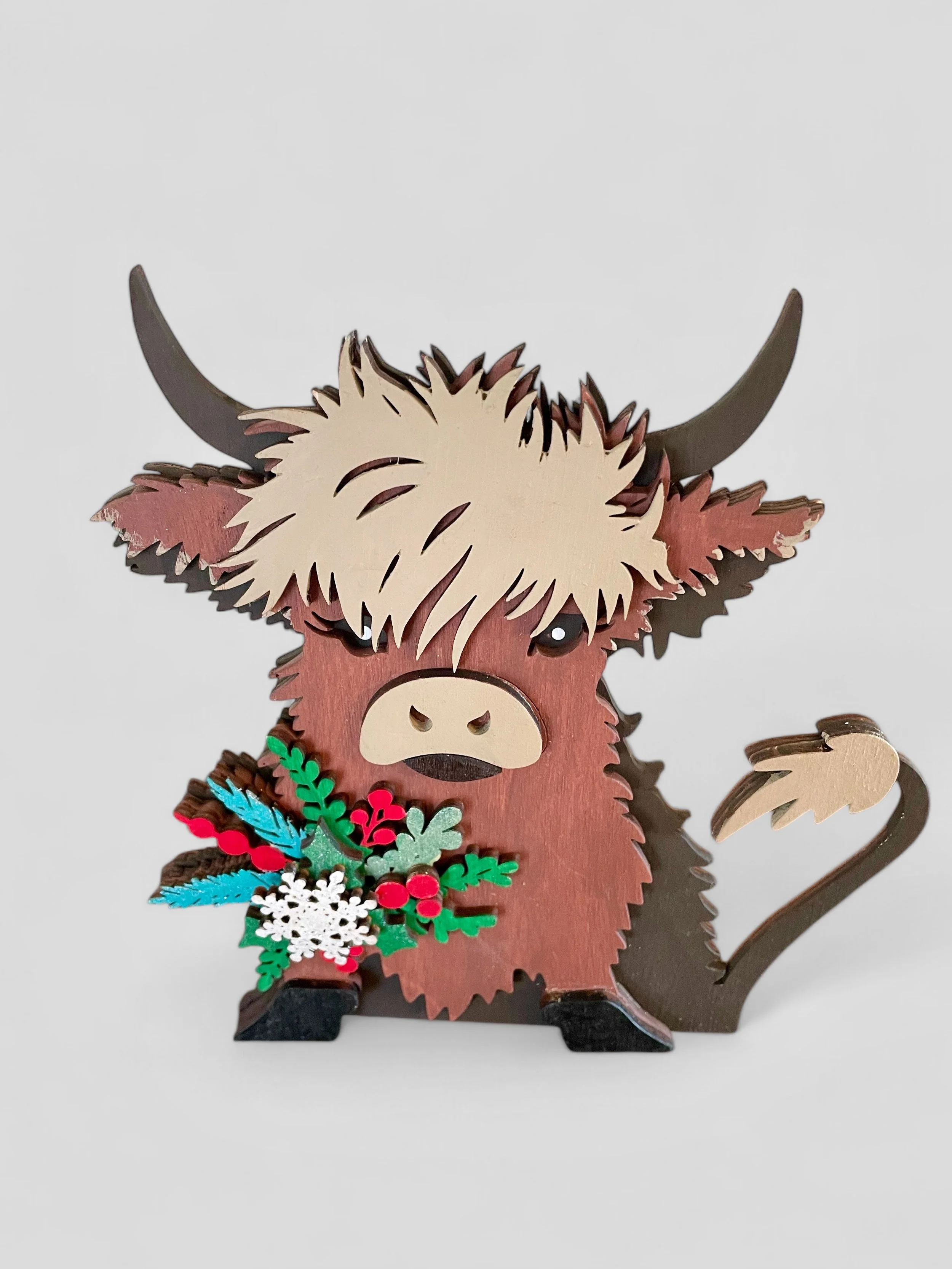 Holiday Highland Cow. Available in two sizes.
