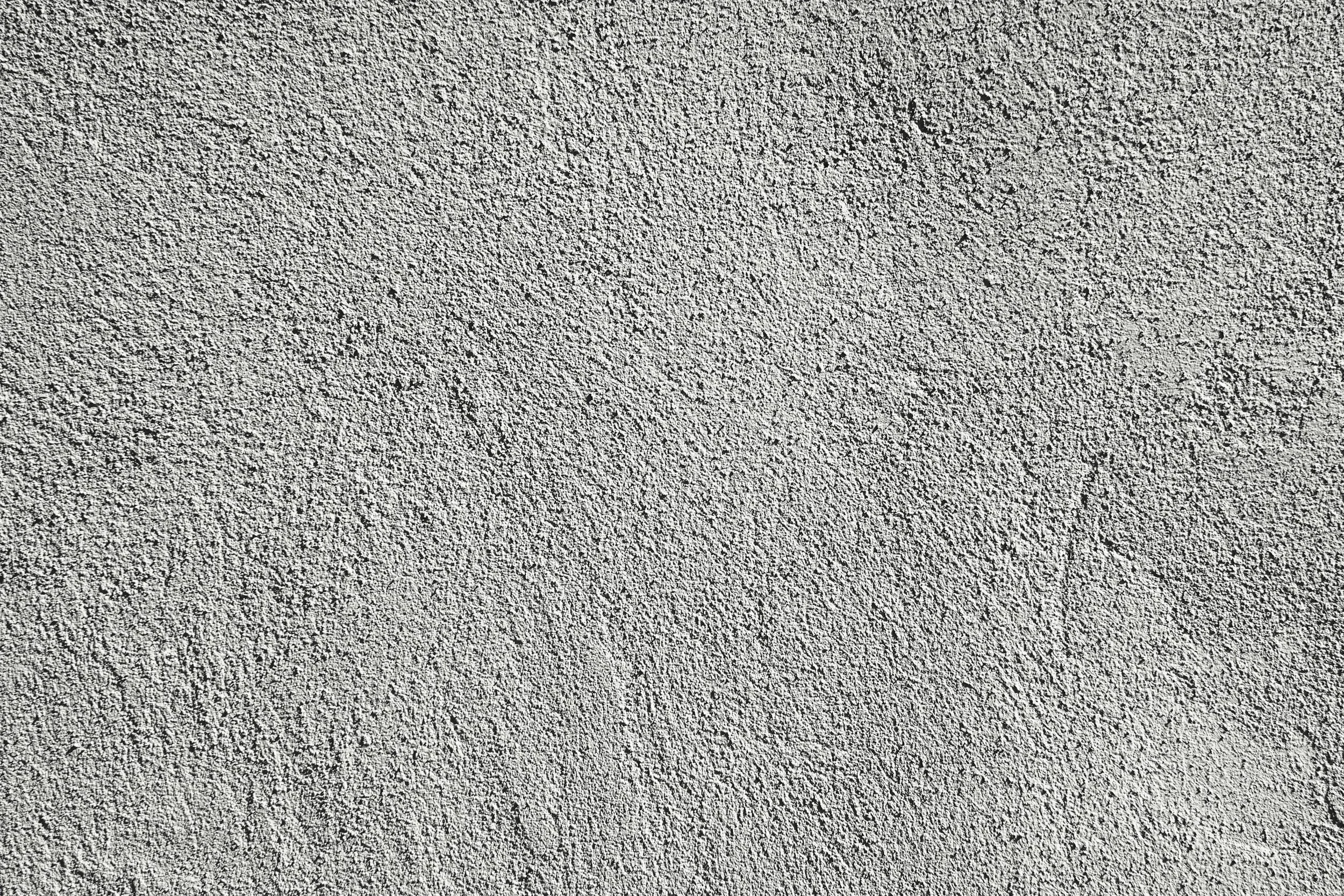 Close-up view of a textured concrete surface.