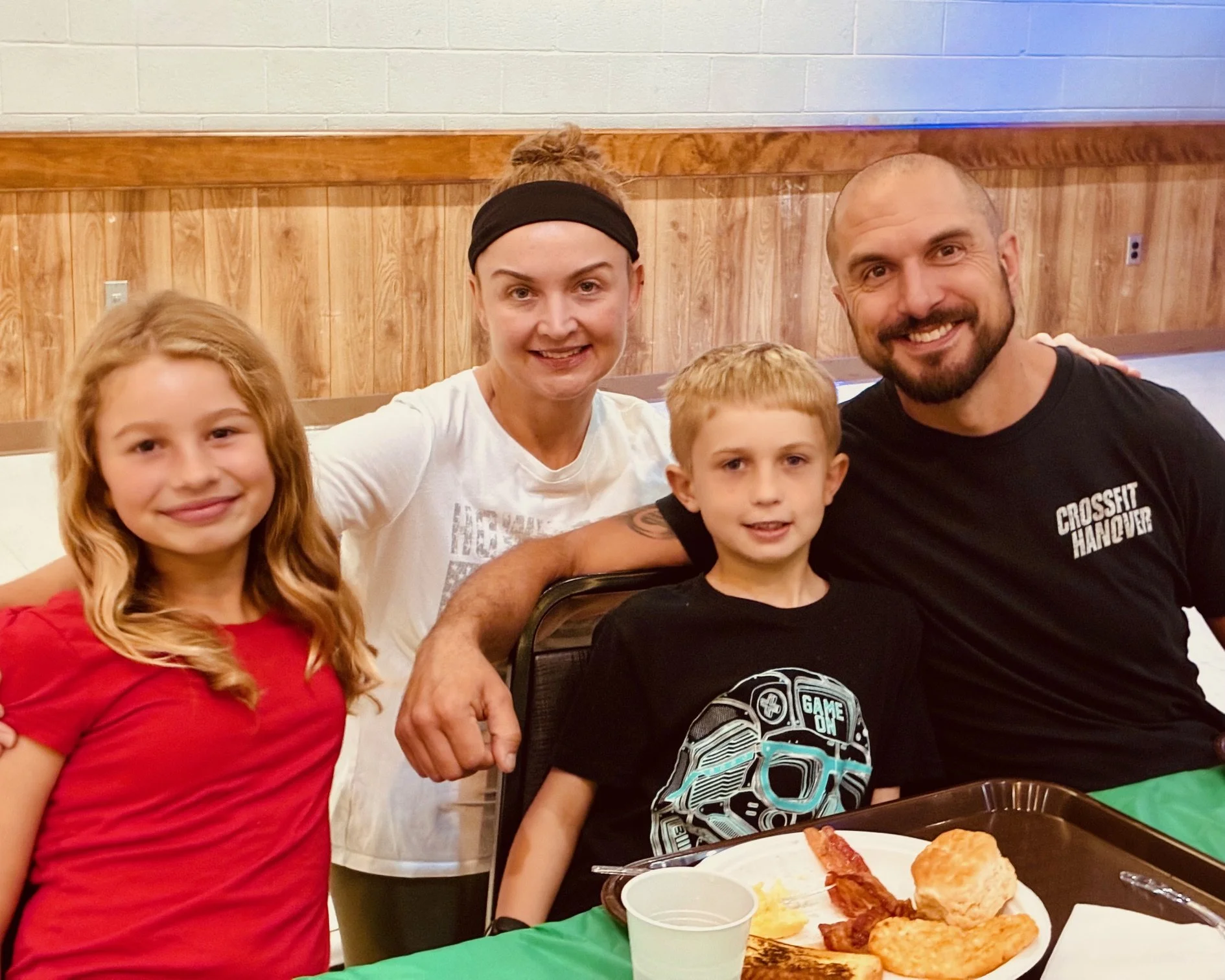 SJS family at fundraising breakfast in social hall