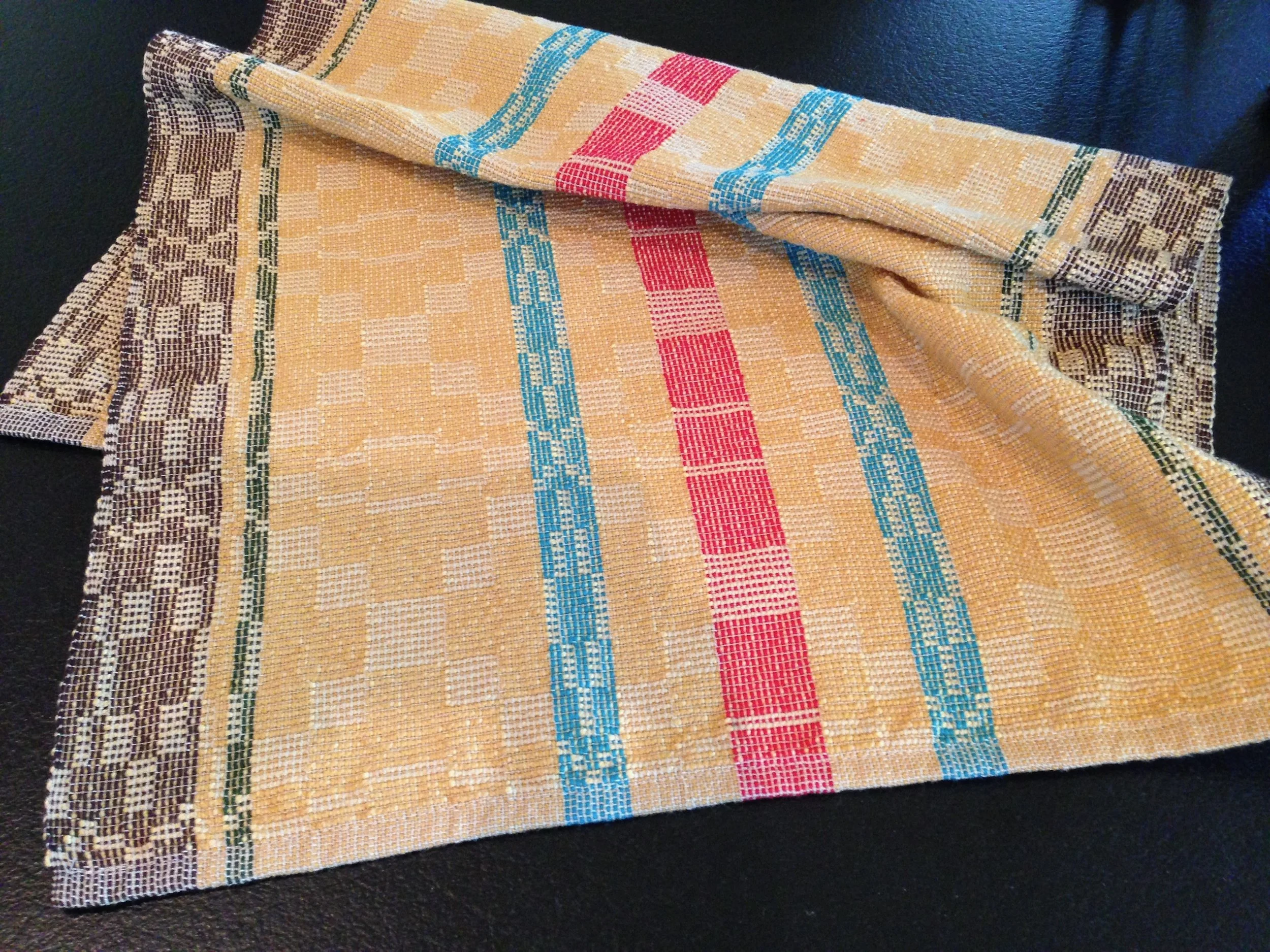 Set of dishtowels based on kitchen color palette