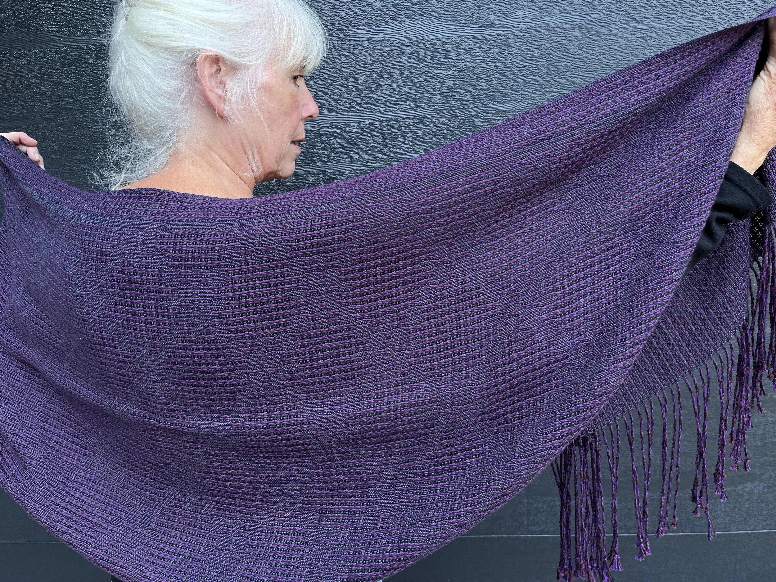 Woven in bombyx silk and lightweight cotton, an elegant, lattice lace wrap