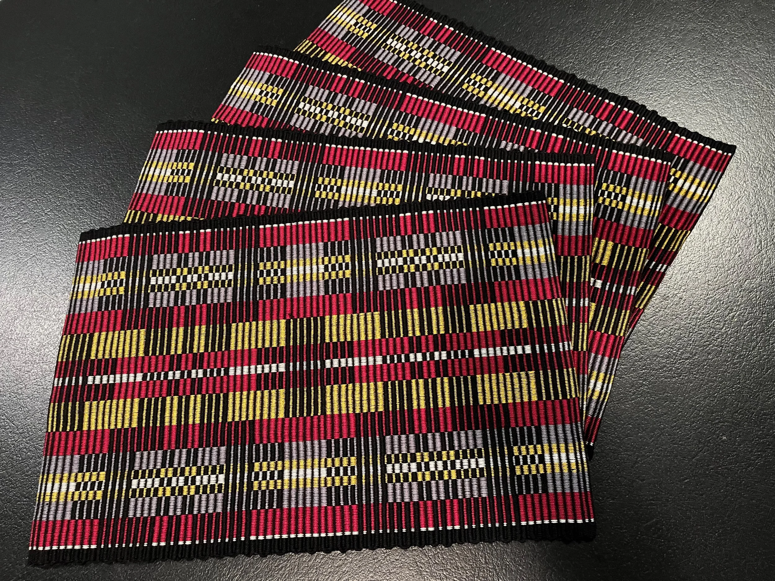 Custom placemats to match dhurrie rug in the dining room