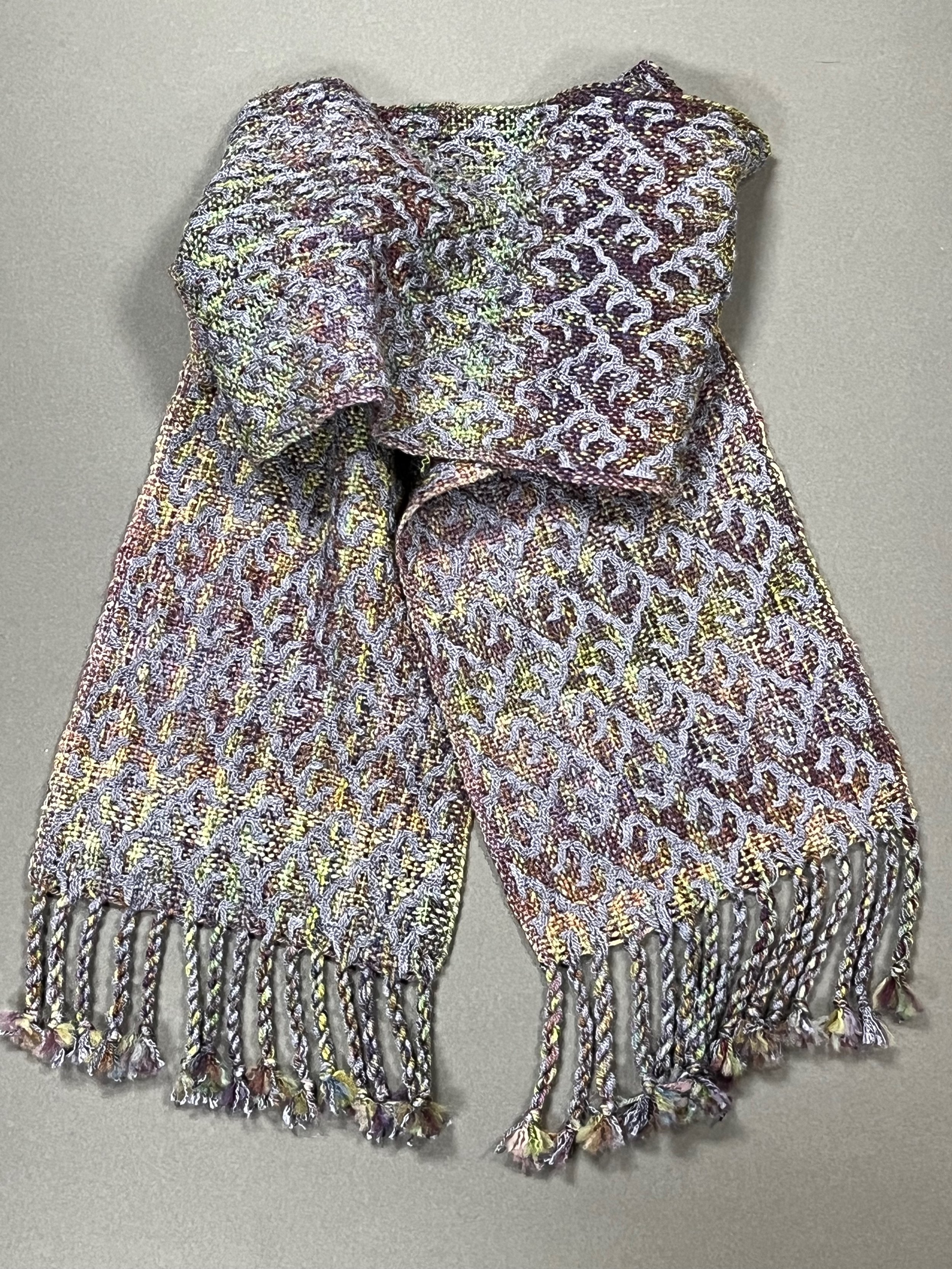 A tussah silk DDW overlay on variegated handspun merino