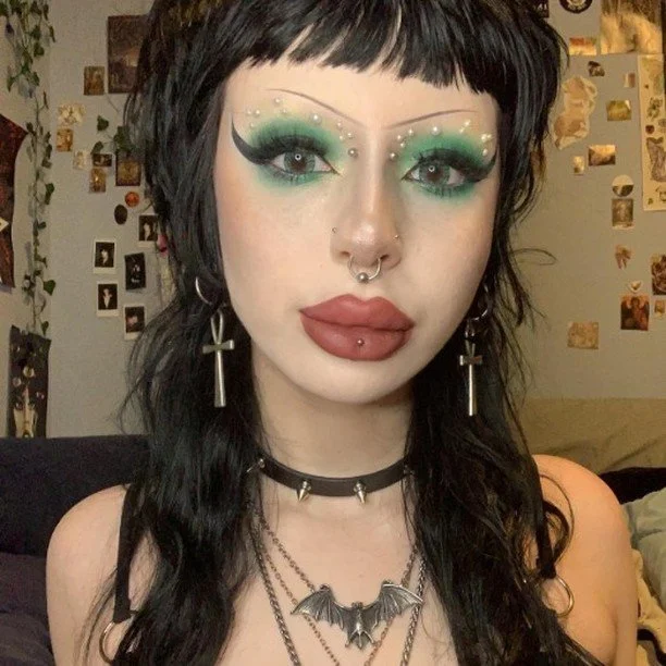 Repost from the beautiful, amazing @luvinvein 🖤
(Visit their profile for $$ off!)
______________________________________
face brought to you by @apocalypticbeautycosmetics 🌿🕸️✨🦇🫀 go to the link in my bio for a special code to get 15% off ;3 KISS