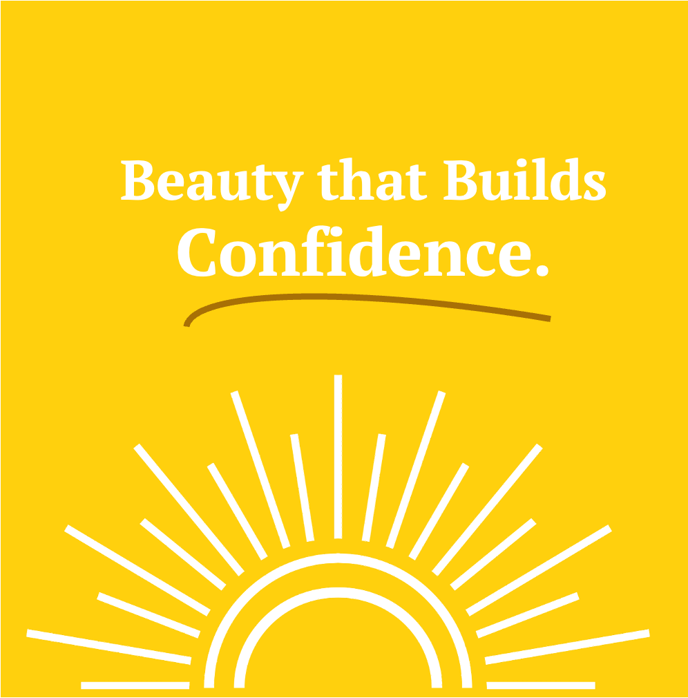 A yellow background with white text that reads 'Beauty that Builds Confidence.' and a stylized white sun with rays extending outward.