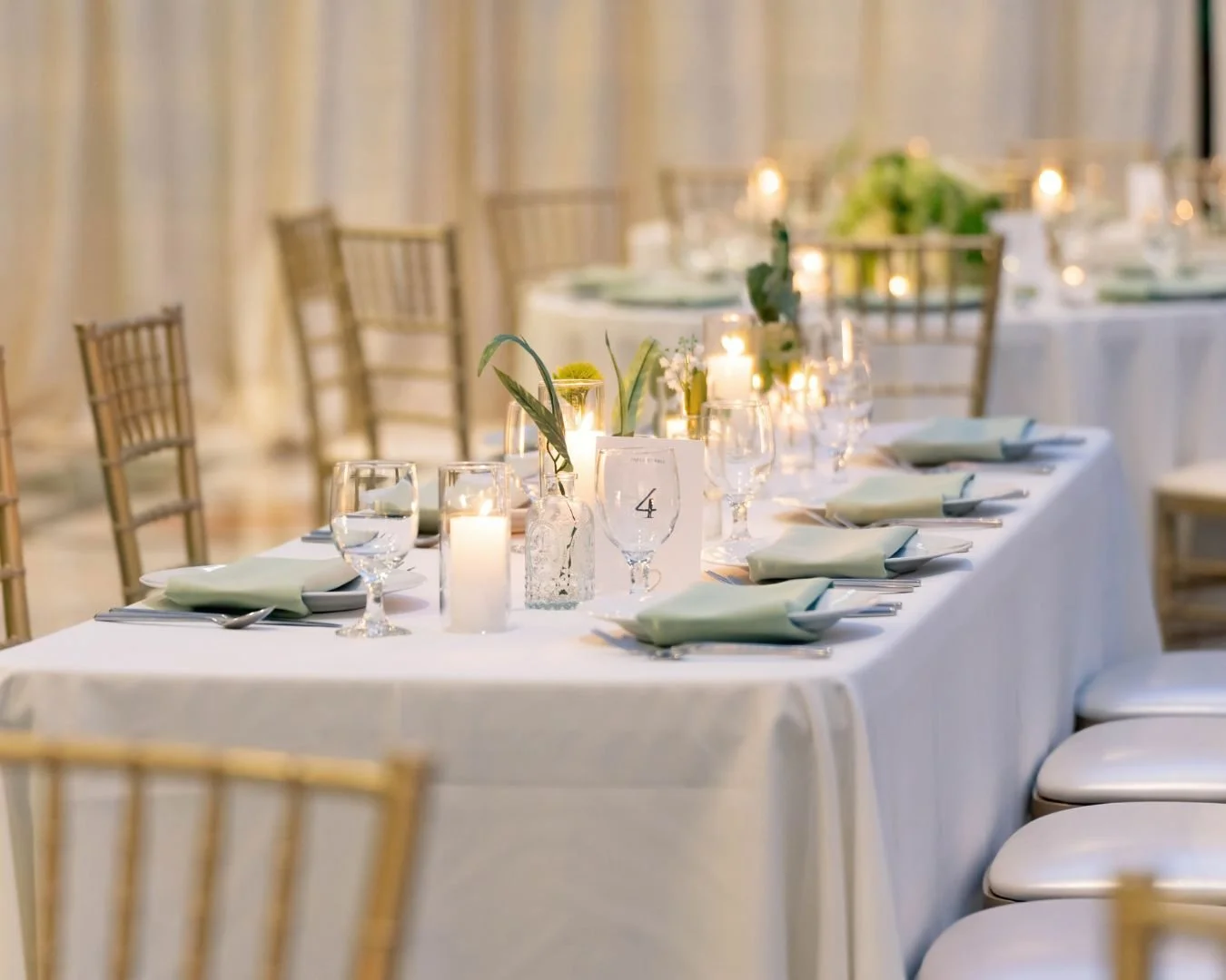 Modern, fresh, and finished with a glow.

The Finks&rsquo; reception design was all about the details&mdash;from the sculptural amaranthus to the warmth of the candlelight against the atrium glass. This palette is proof that timeless and trendy can l