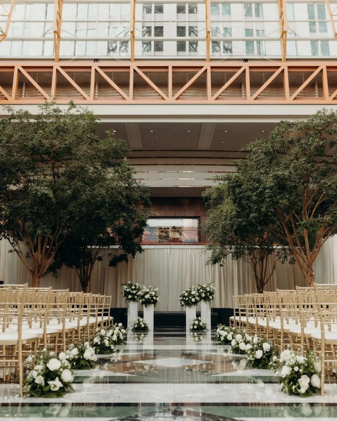 Hope &amp; Ben chose the perfect backdrop for their forever. The glass atrium filled their ceremony in the softest natural light, proving you don&rsquo;t need to be outdoors to be surrounded by the beauty of nature and the city skyline.

Venue @found