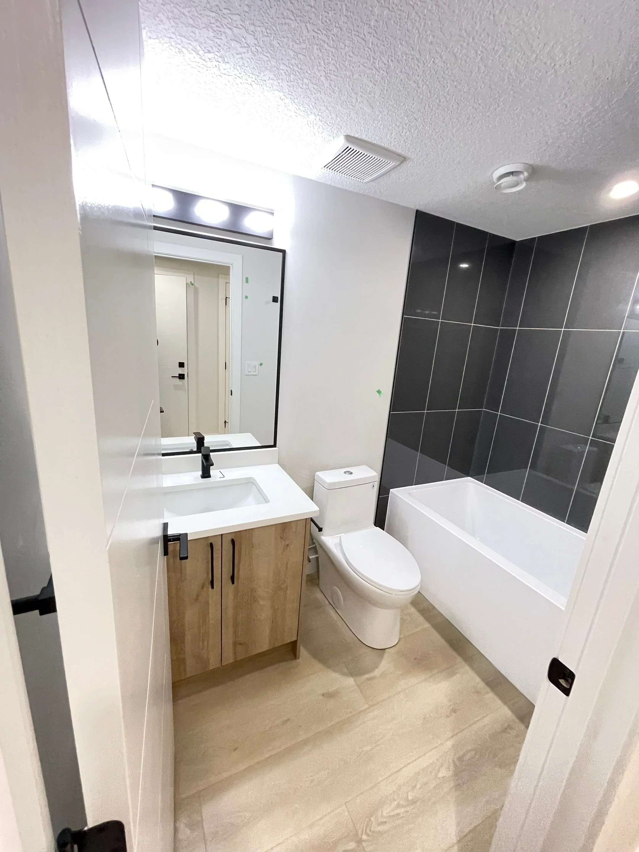 Archive Contracting-new-build-bonnie-doon-edmonton-alberta-basement-bathroom.webp