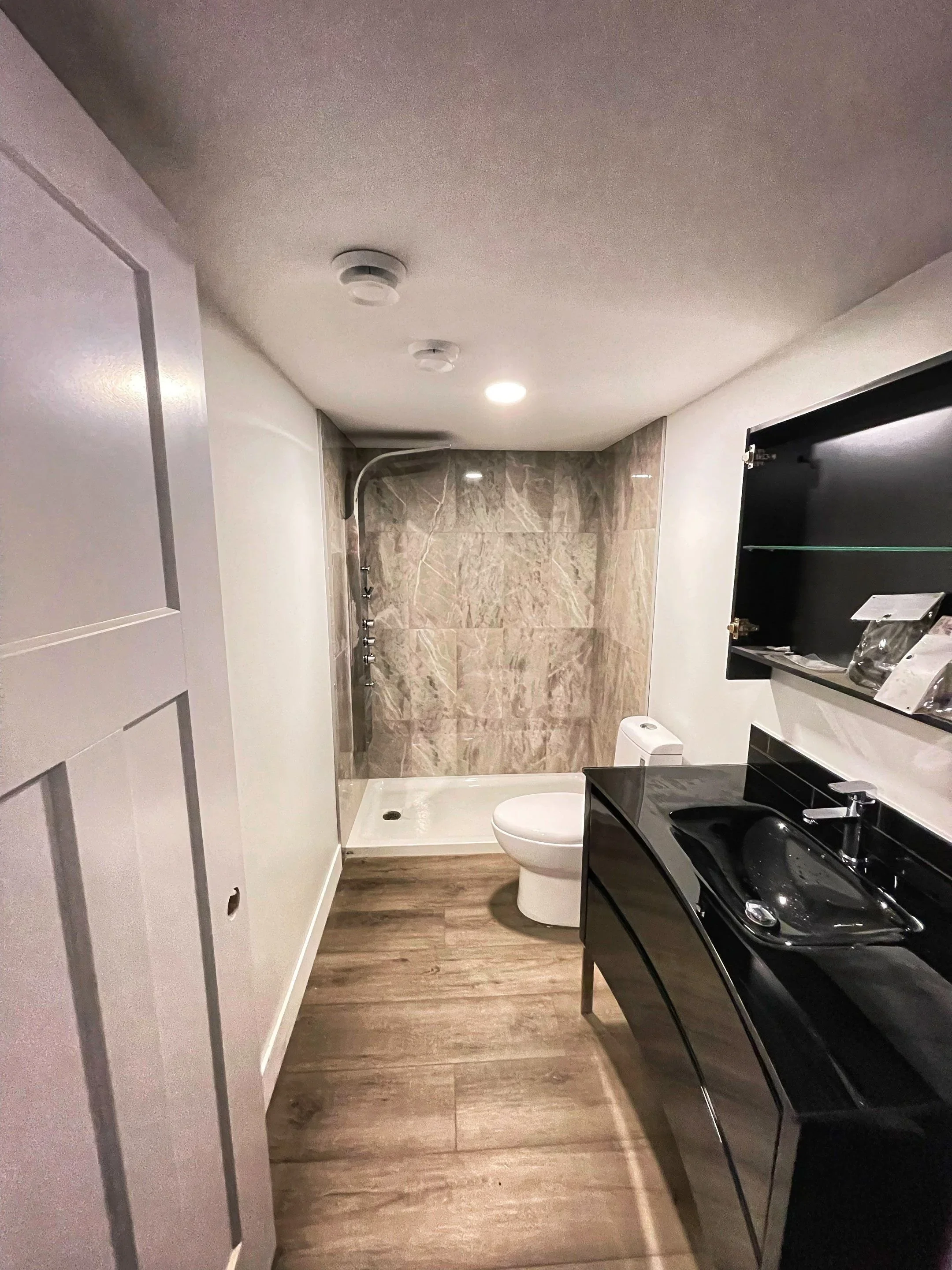 Archive Contracting-basement-development-edmonton-alberta-full-bathroom.webp