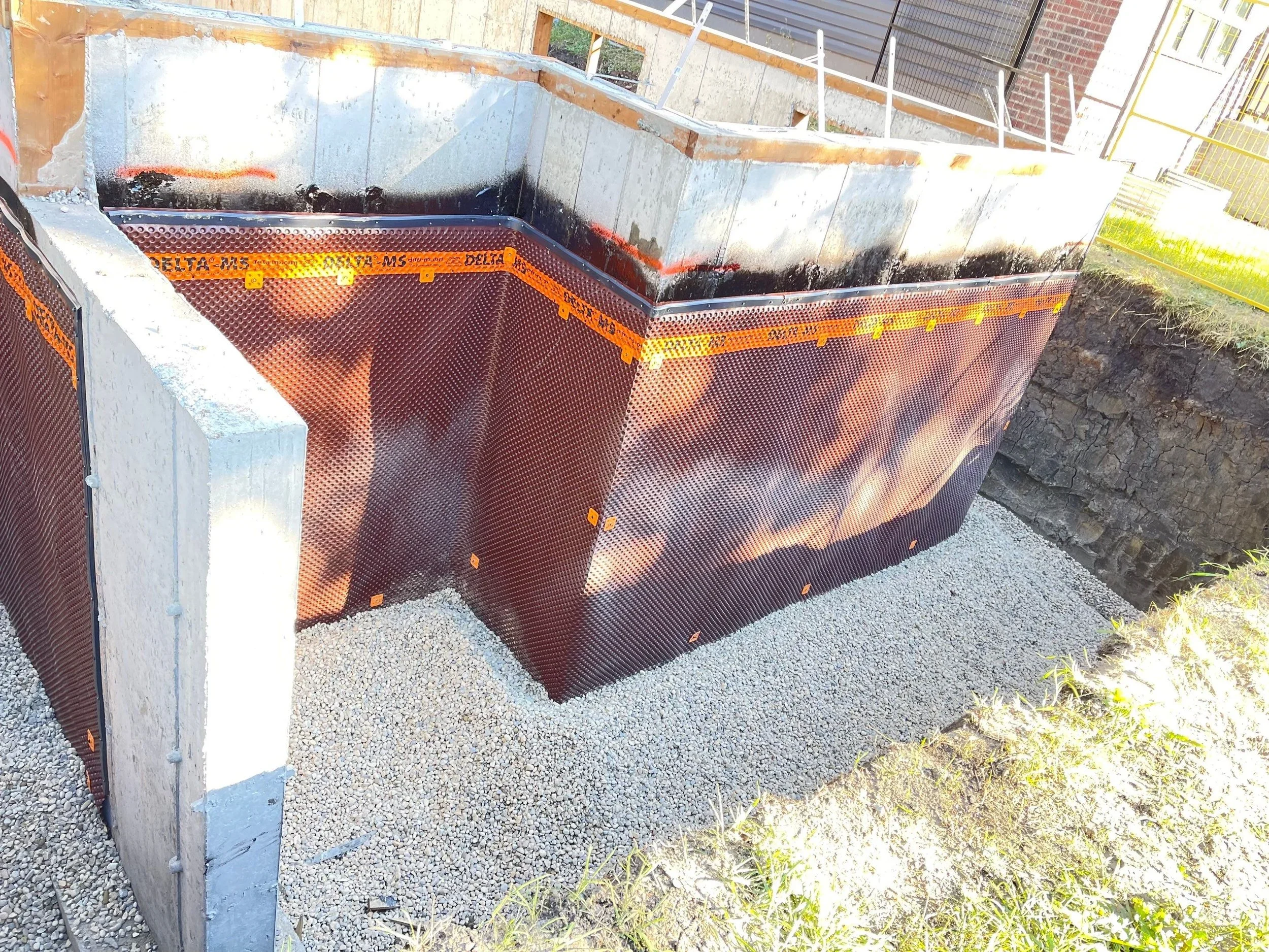 Archive Contracting-new-build-bonnie-doon-edmonton-alberta-foundation-barrier.webp