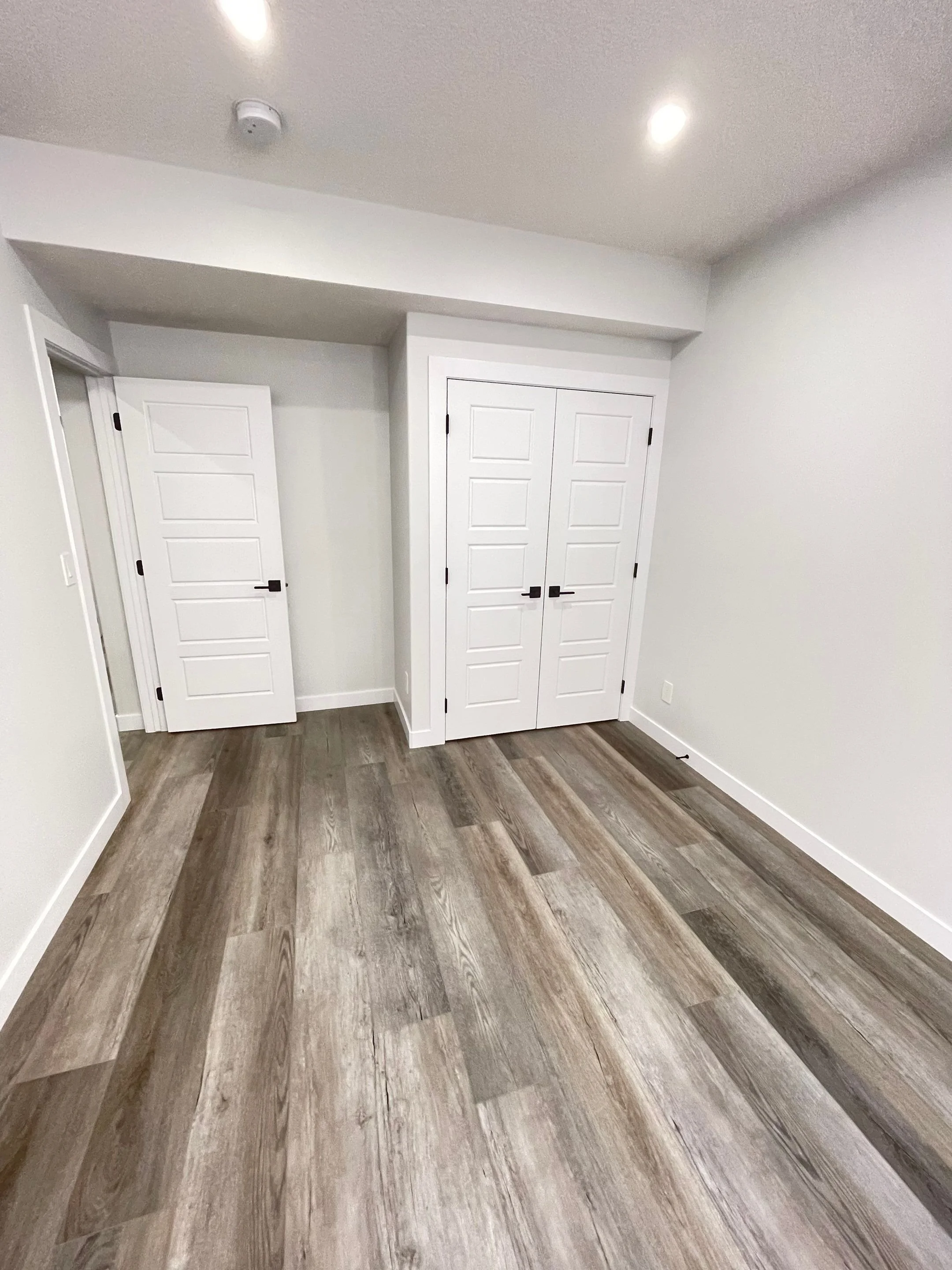Archive Contracting-basement-development-leduc-edmonton-alberta-closet-doors.jpg