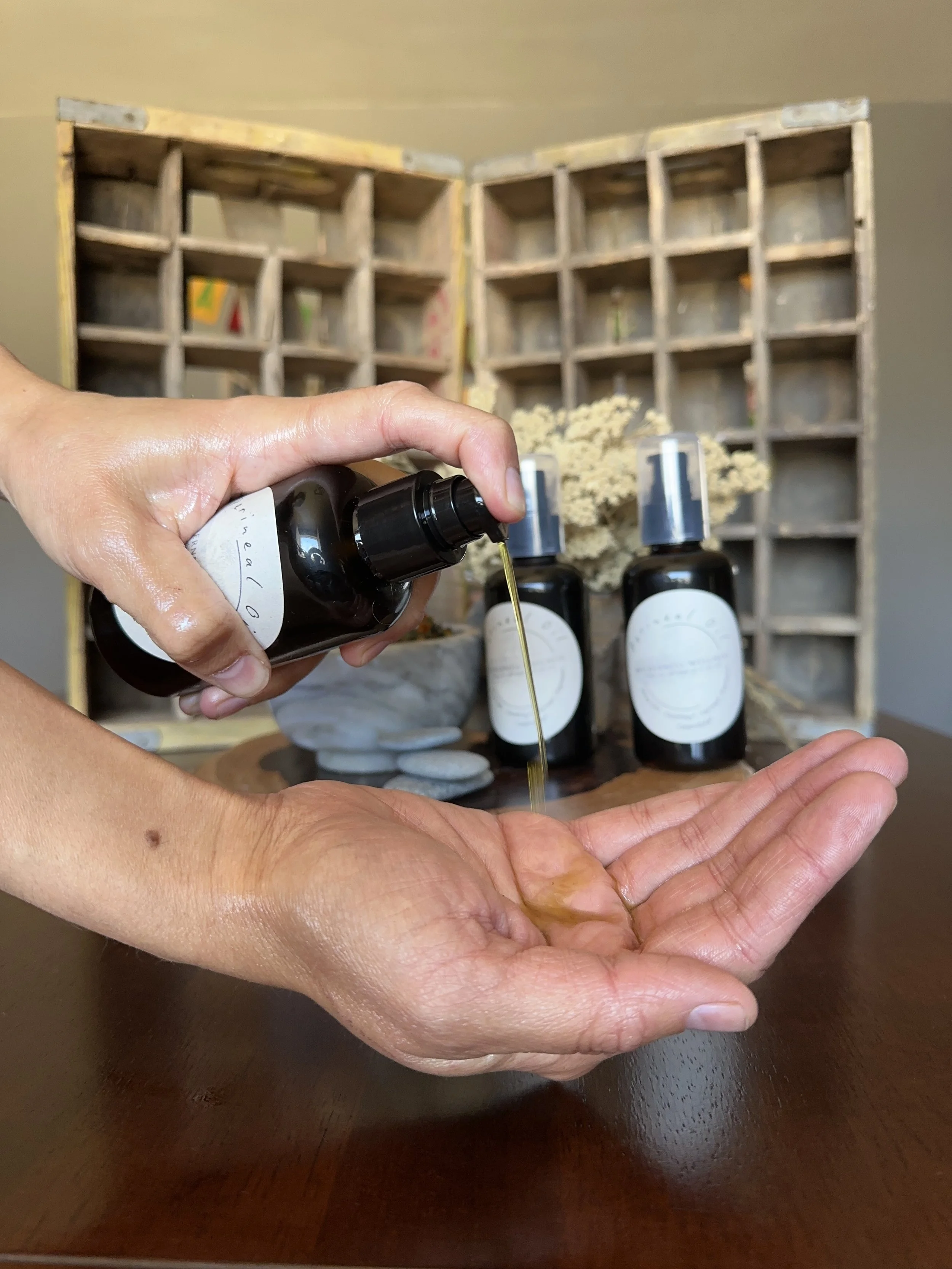 Perineal oil into hand.JPG