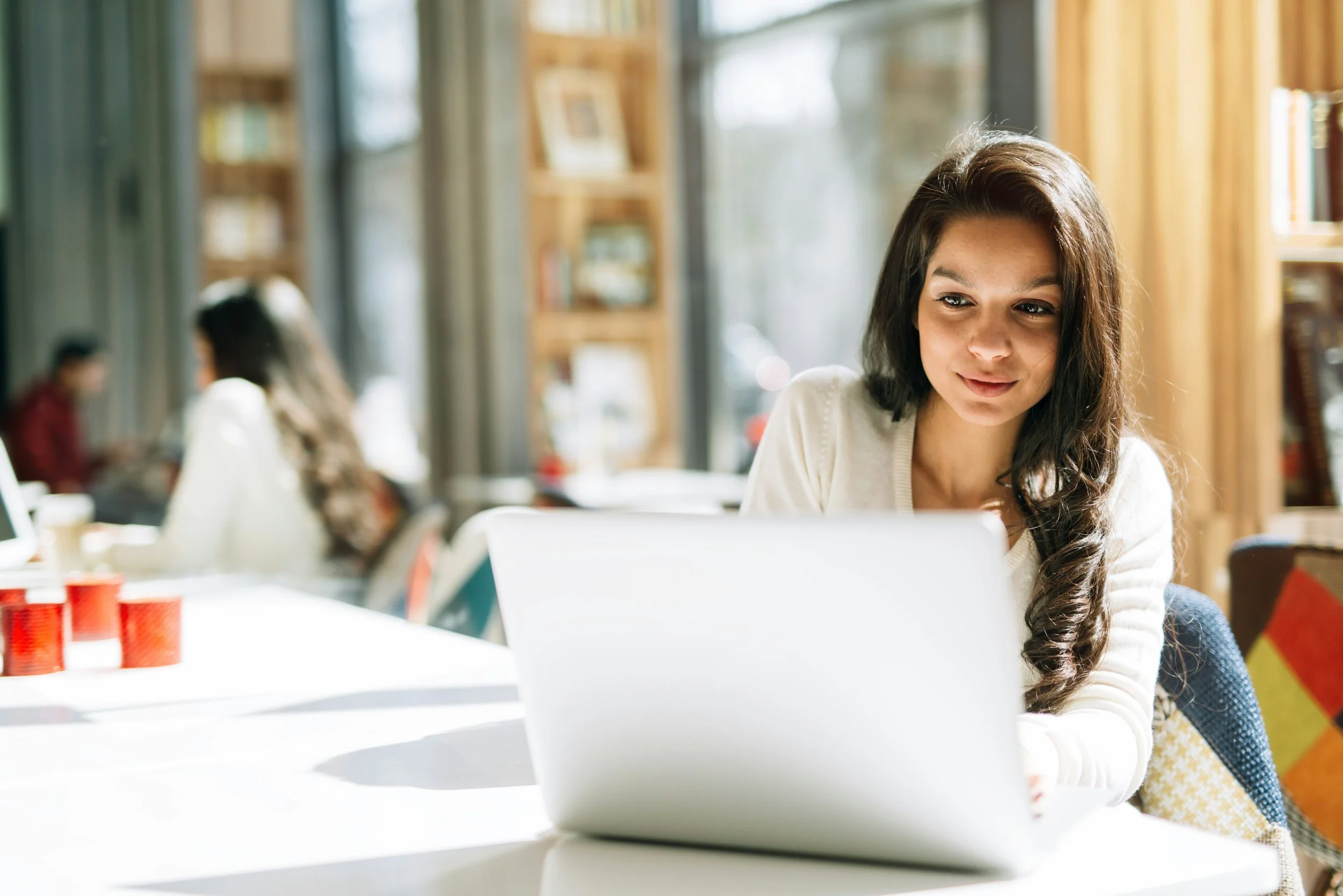 woman looking at laptop