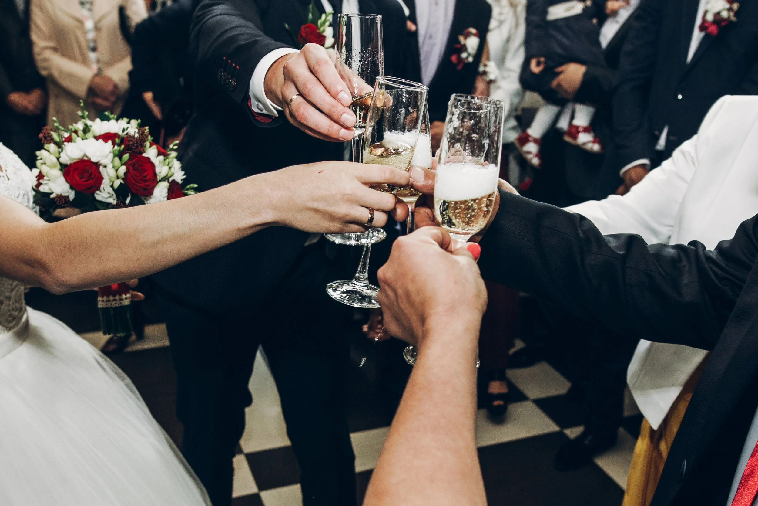 people-toasting-with-champagne-glasses-at-wedding-2025-03-15-22-12-16-utc.JPG