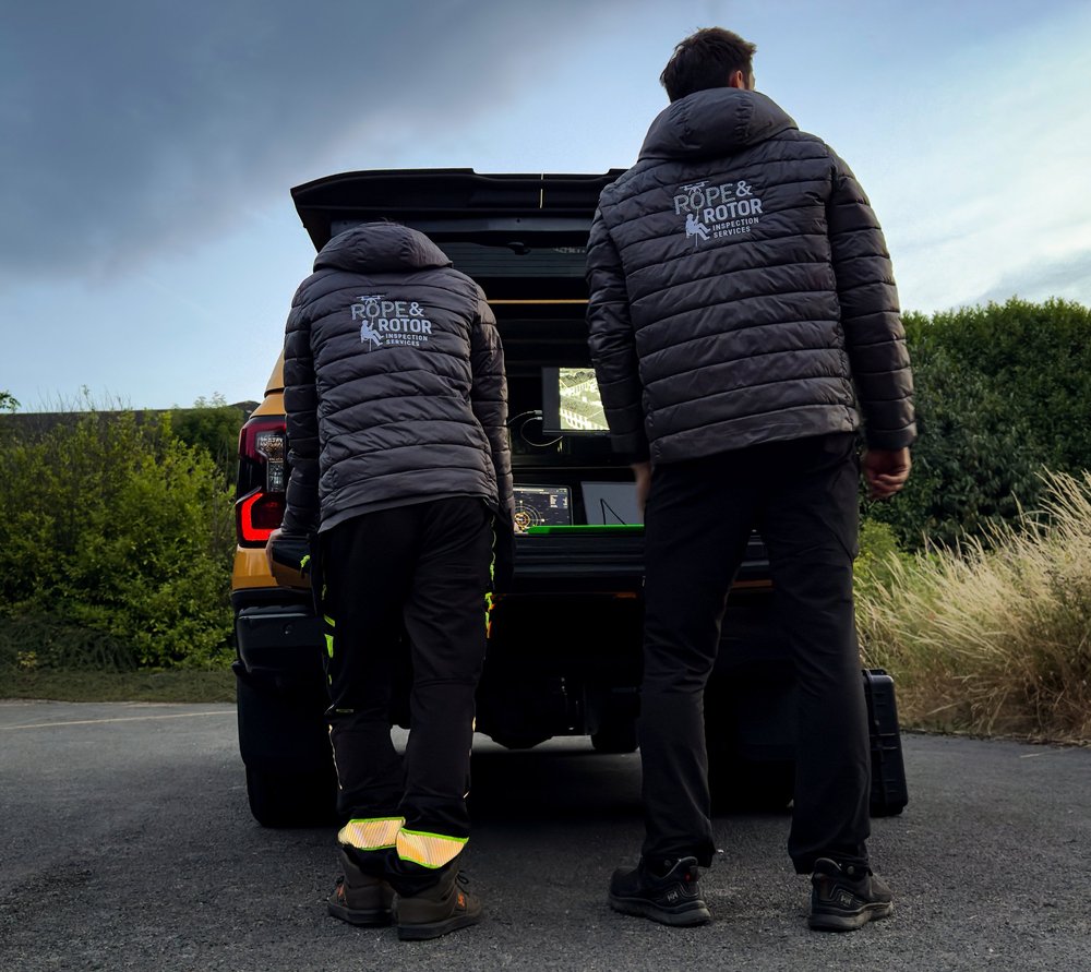 Rope and Rotor team preparing equipment at the rear of their vehicle