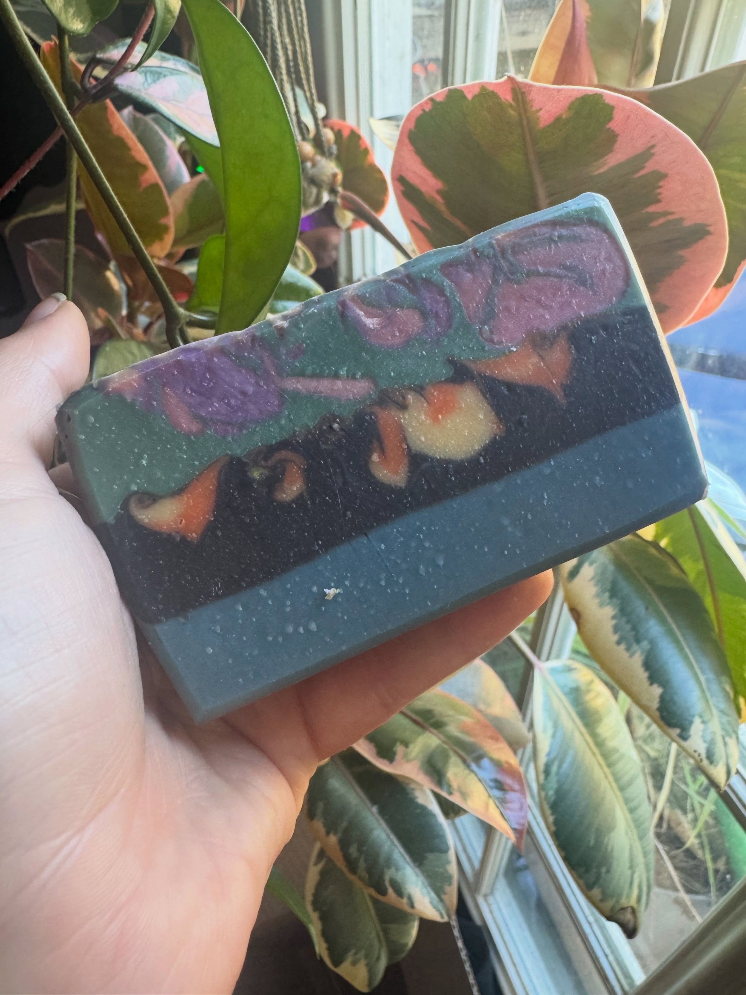 🖤✨ GIVEAWAY TIME, BOOK LOVERS! ✨🖤

The first person to correctly guess what this rough-draft soap is inspired by will WIN a FULL Fantasy Set!

This is just the first step in the soap-making process, so it still has stamps and other magical finishin