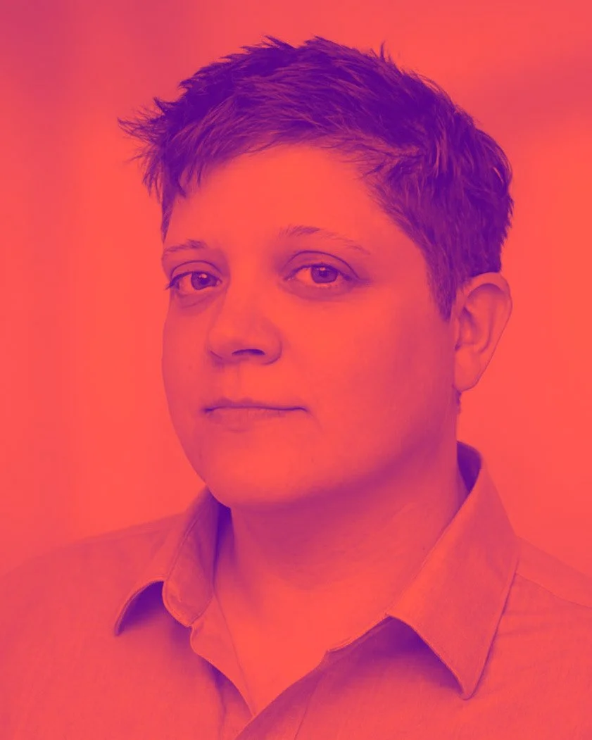 Sarah Russell, CEM headshot photo with a red orange color filter applied to the photo