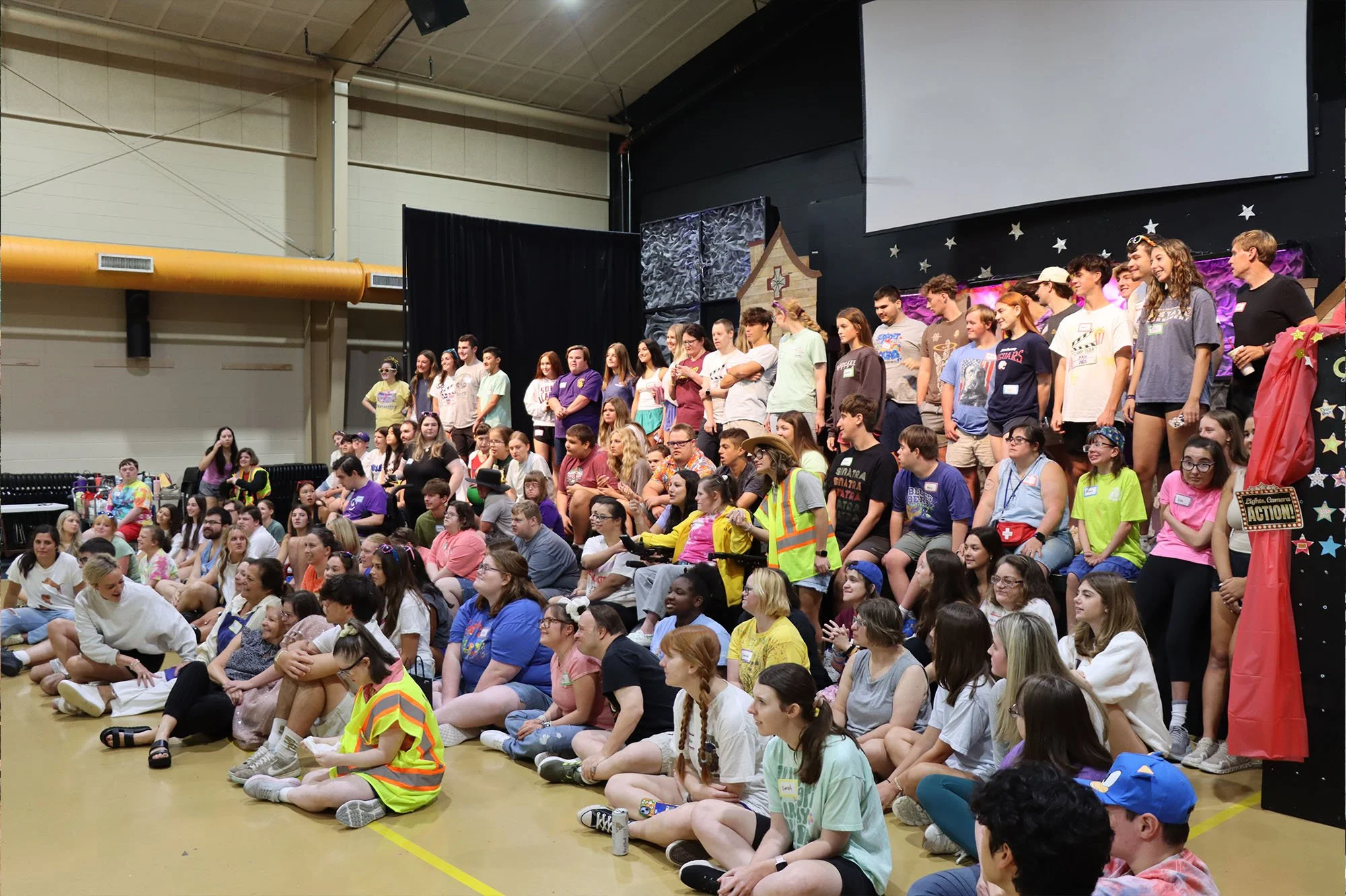 Camp Tiger Paw participants, volunteers, and staff pose for a group photo.