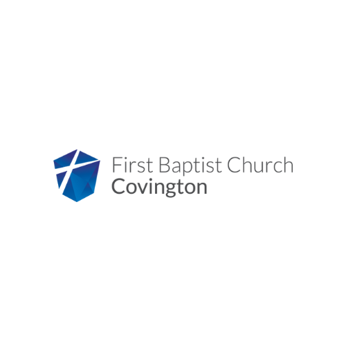 Logo of First Baptist Church Covington featuring a stylized blue shield with a white cross and the church's name.