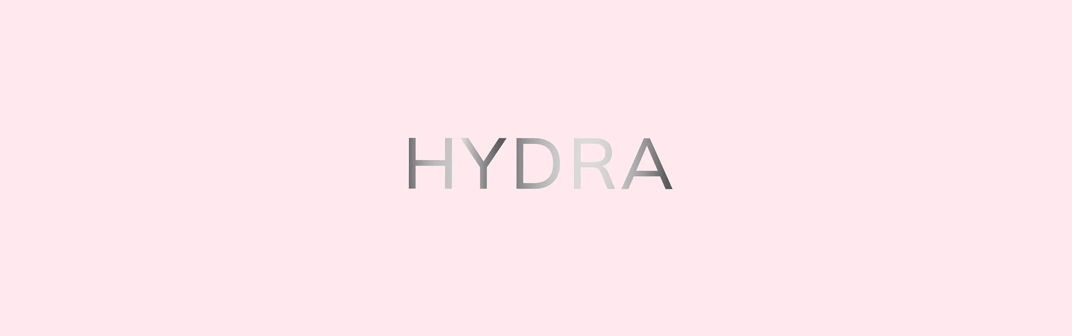 Fondo rosa claro con la palabra 'HYDRA' en letras gris claro en el centro_línia bàsica de Deliplus_mercadona_diseño de packaging de cosmètica de estudio berlin