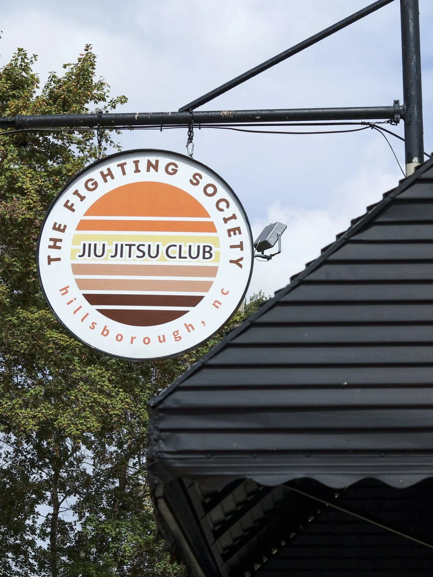 The fighting society hillsborough logo