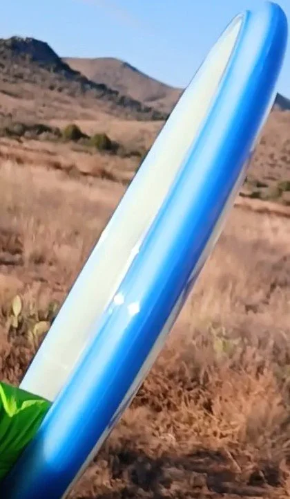 Dynamic Discs Lucid Judge Penny Flower Spiral profile.jpg