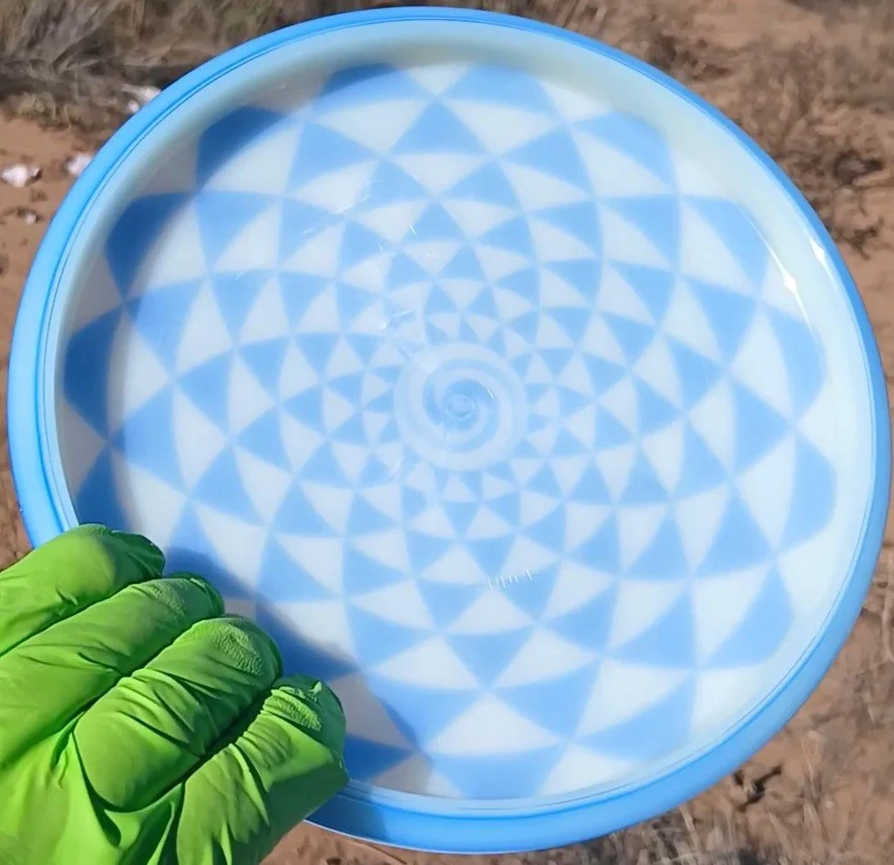 Dynamic Discs Lucid Judge Penny Flower Spiral blue back.jpg