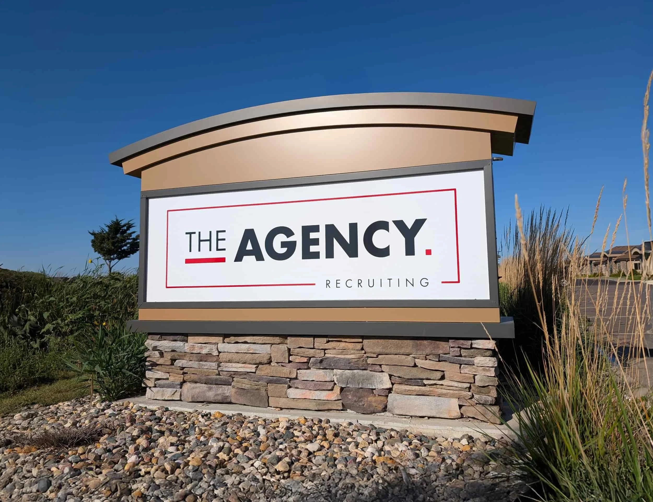 The Agency Recruiting office sign in Sioux Falls, South Dakota, headquarters serving employers and job seekers nationwide.