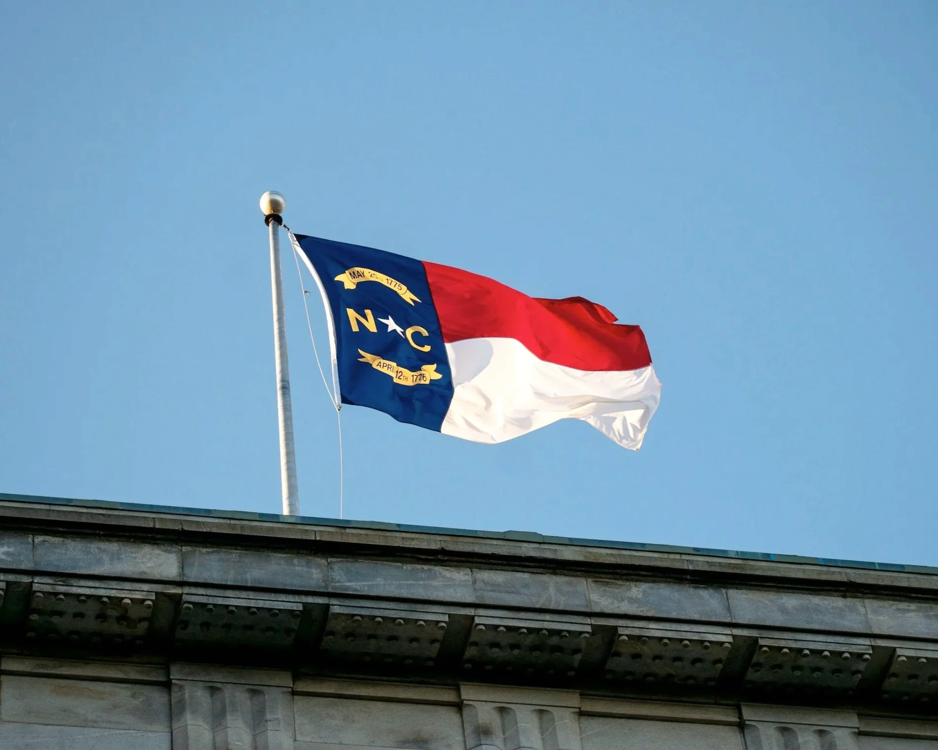 North Carolina state flag in Charlotte, NC representing executive search and recruiting services in the Charlotte metropolitan area.