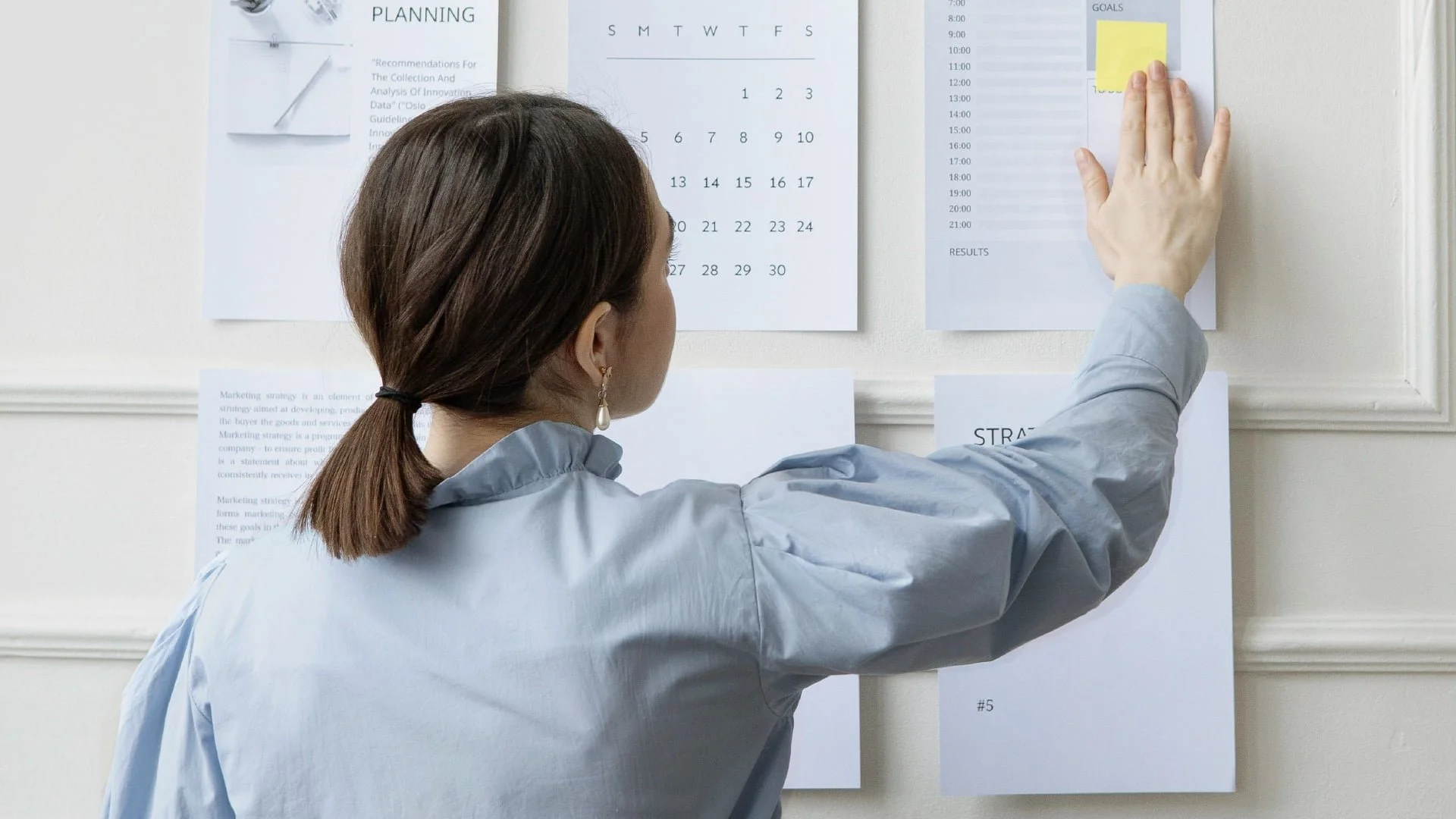 A young, legal professional in a modern office, representing the changing face and expectations of law firm culture.