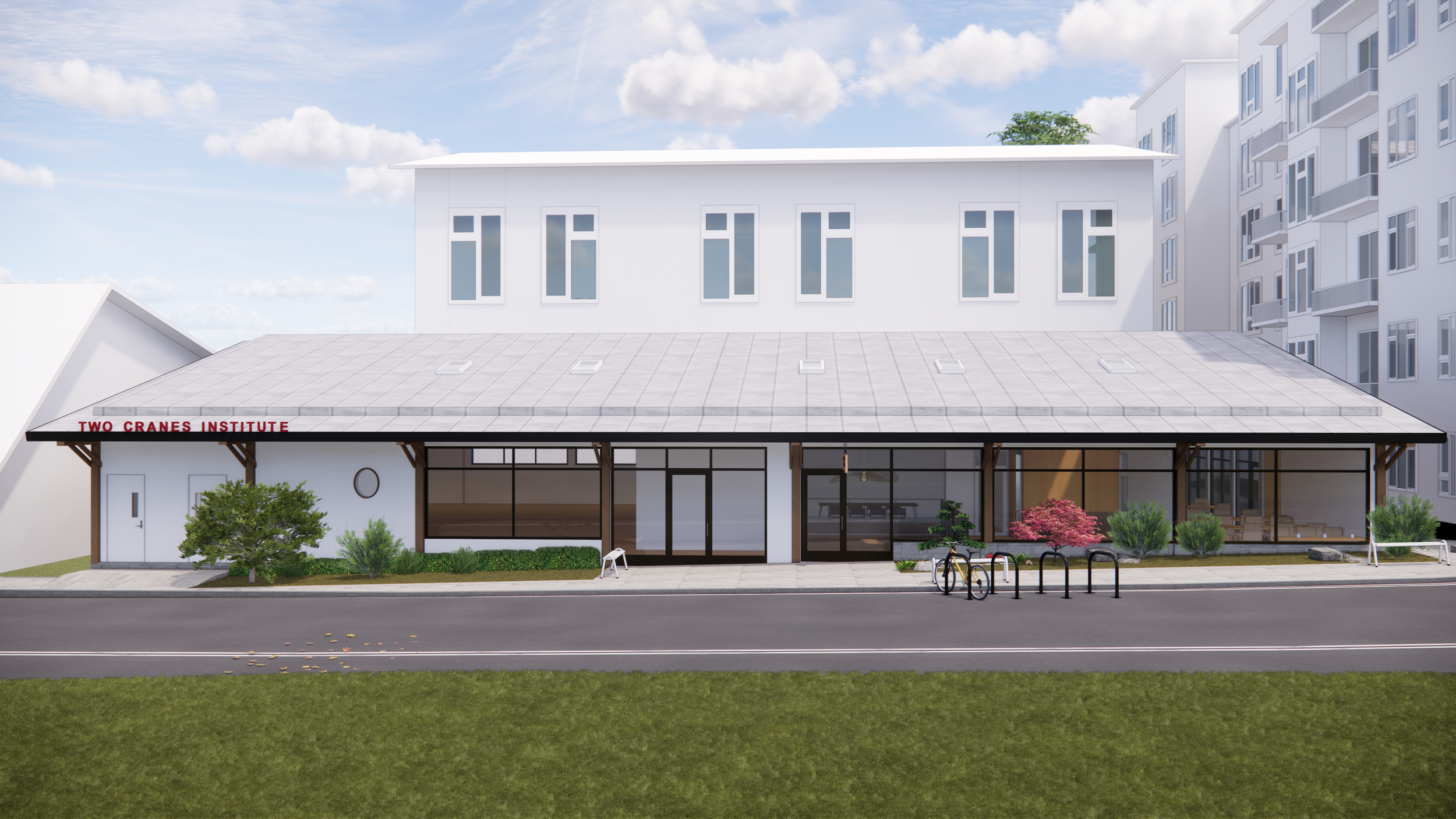 Rendering of a modern, two-story building labeled Two Cranes Institute, with large glass windows, surrounded by bushes and trees, in an urban setting with neighboring buildings and a sidewalk with bike racks.