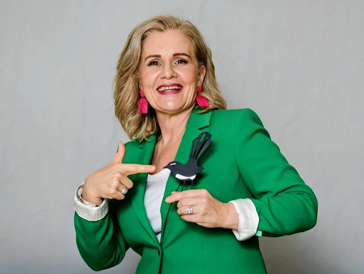 Lee-Anne Simpson holding a Willy Wagtail symbol representing Integria Consulting’s leadership and safeguarding culture focus