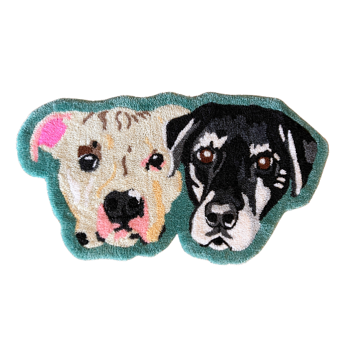 A plush rug in the shape of a golden retriever and a black and white dog side by side.