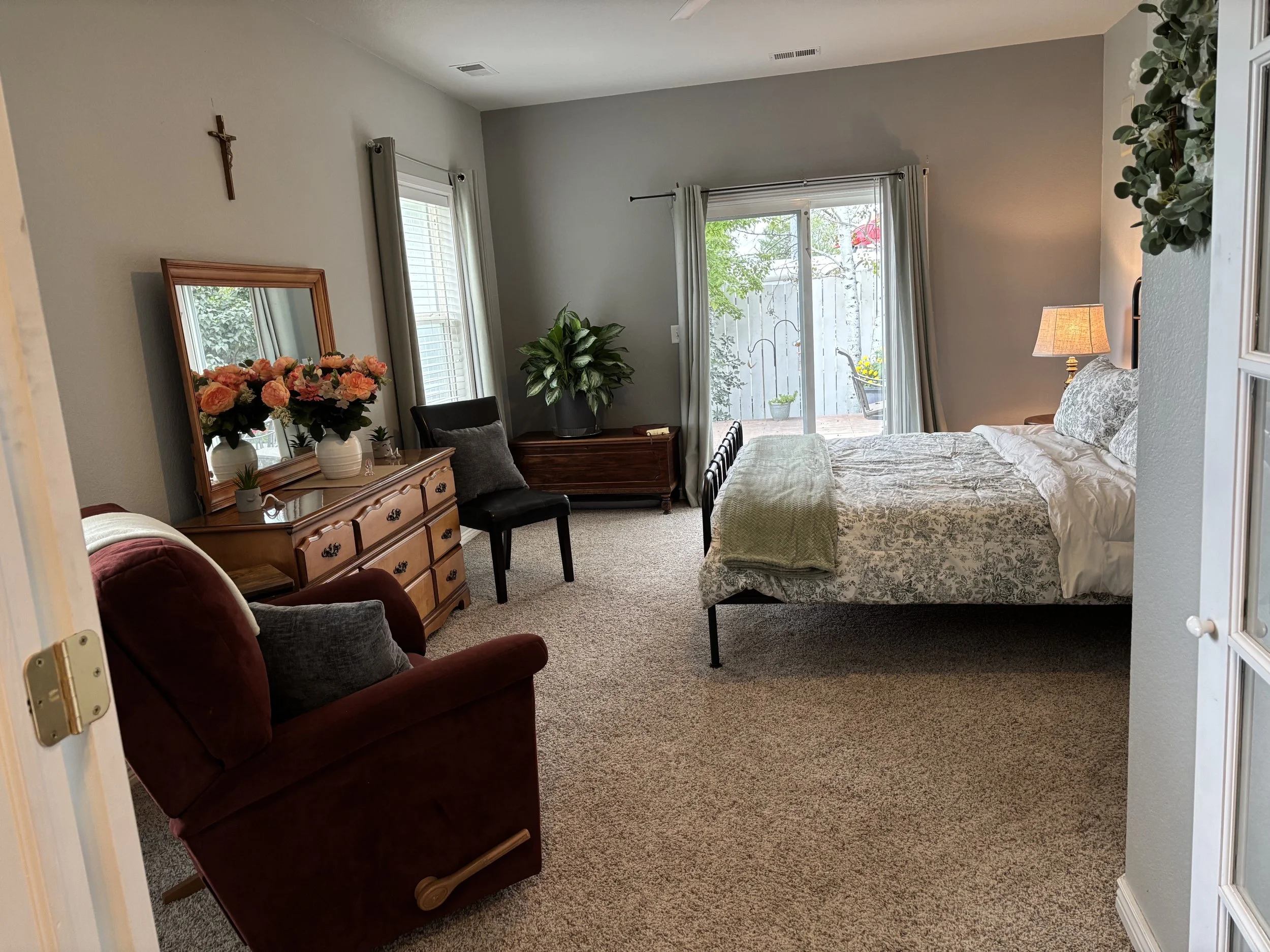 Master bedroom with King sized bed and attached bathroom